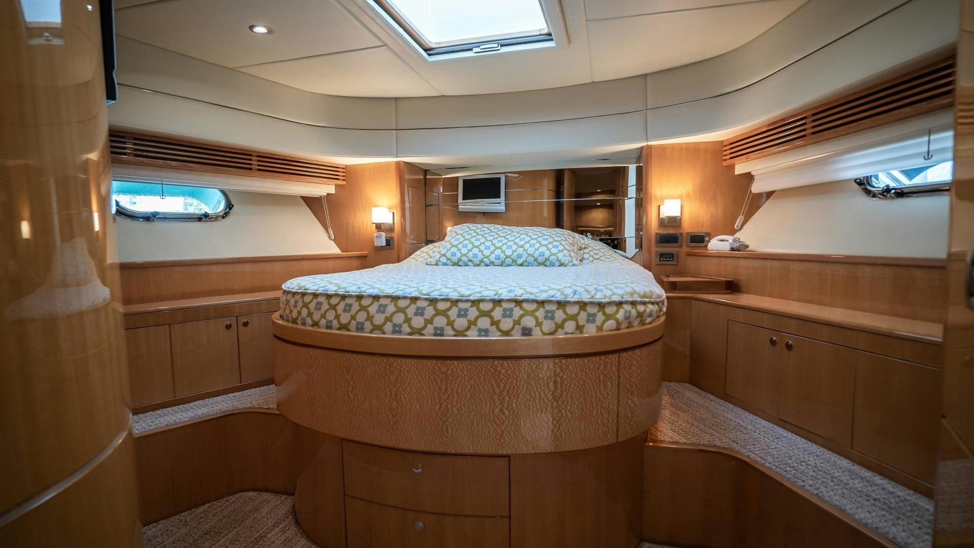 a bed in a room aboard FULL HOUSE Yacht for Sale
