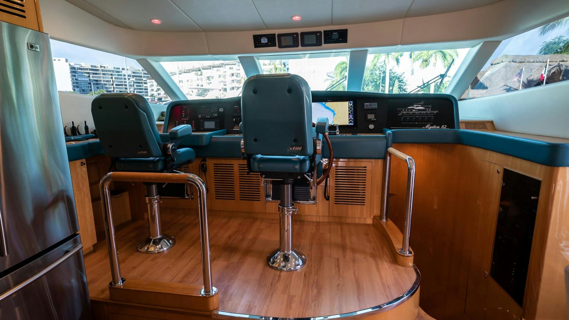 a group of chairs in a bus aboard FULL HOUSE Yacht for Sale