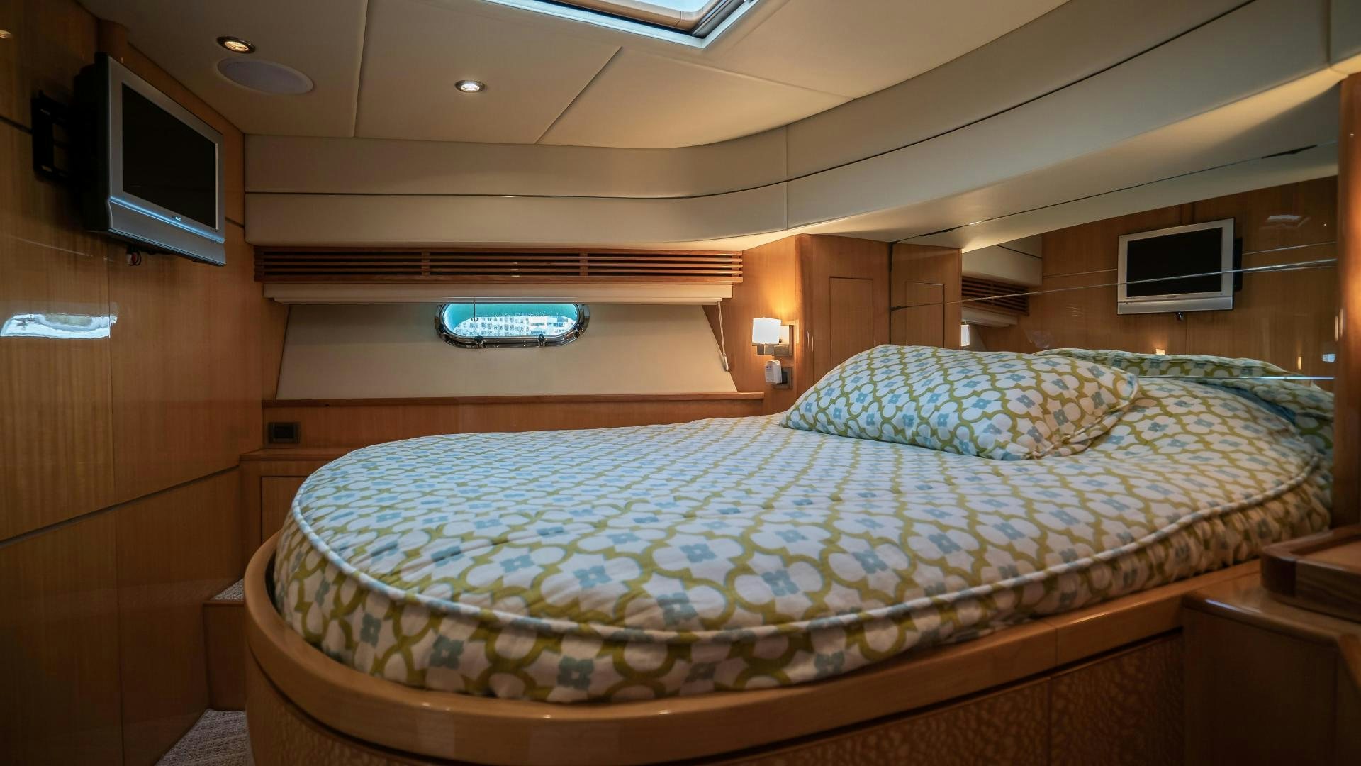 a bed in a room aboard FULL HOUSE Yacht for Sale