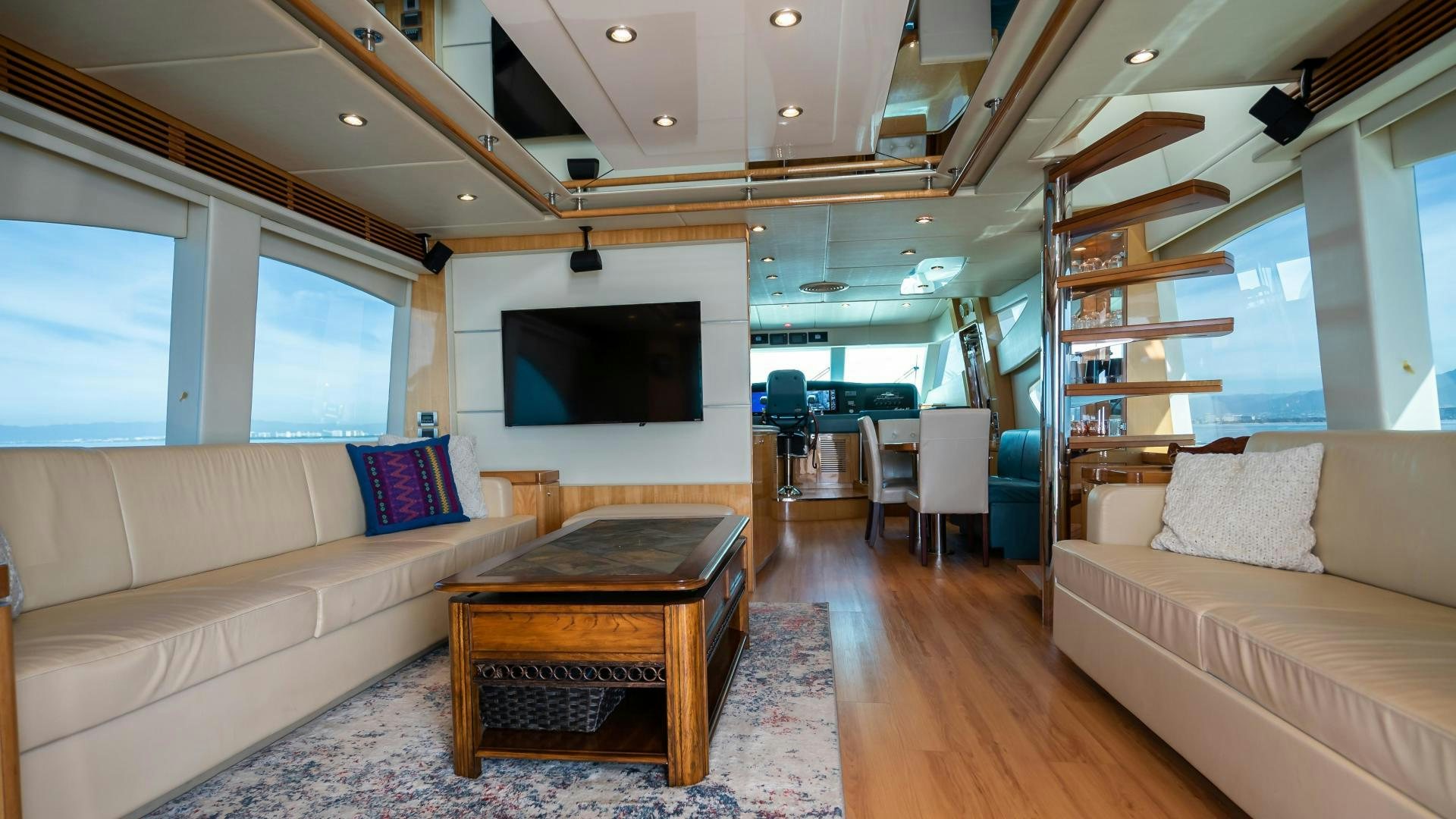 a living room with a couch and a tv aboard FULL HOUSE Yacht for Sale