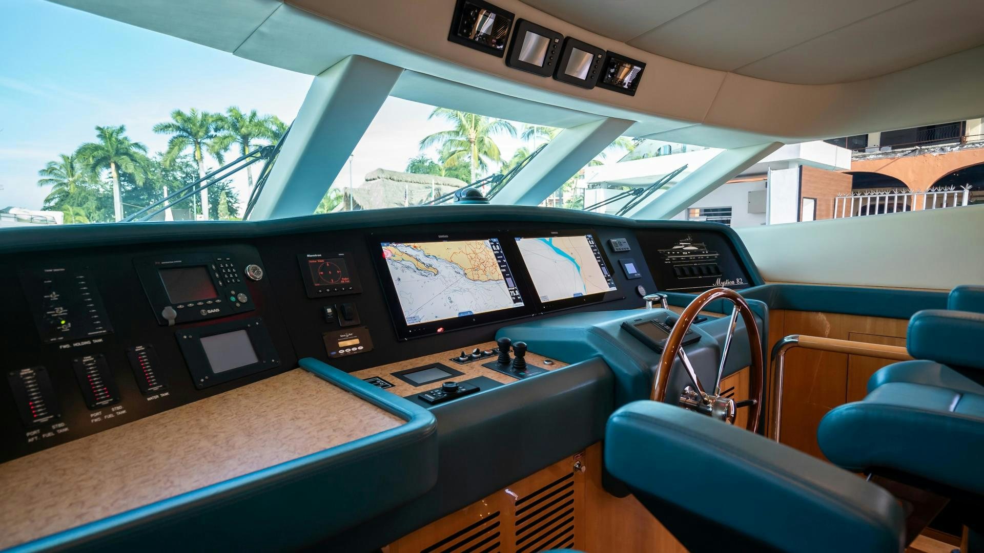 inside of a car aboard FULL HOUSE Yacht for Sale