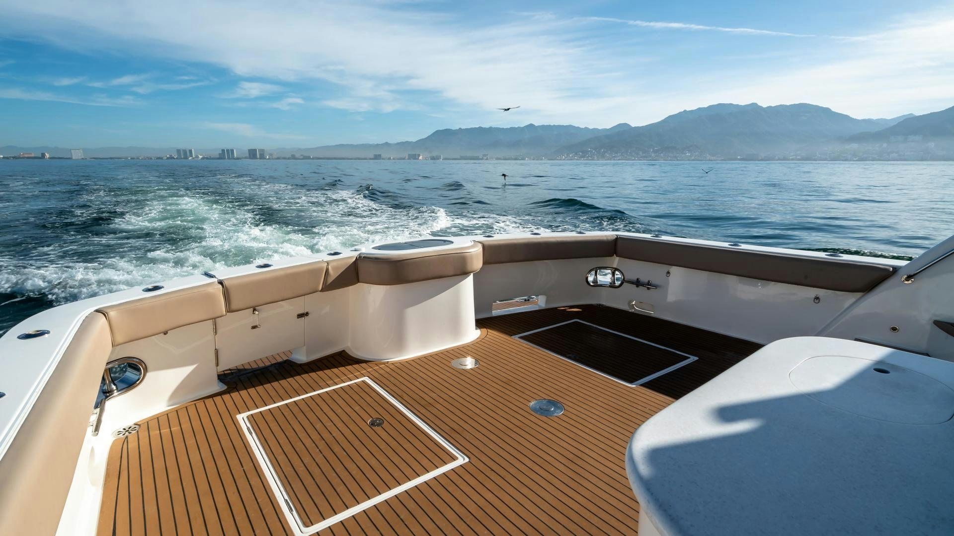 a boat on the water aboard FULL HOUSE Yacht for Sale
