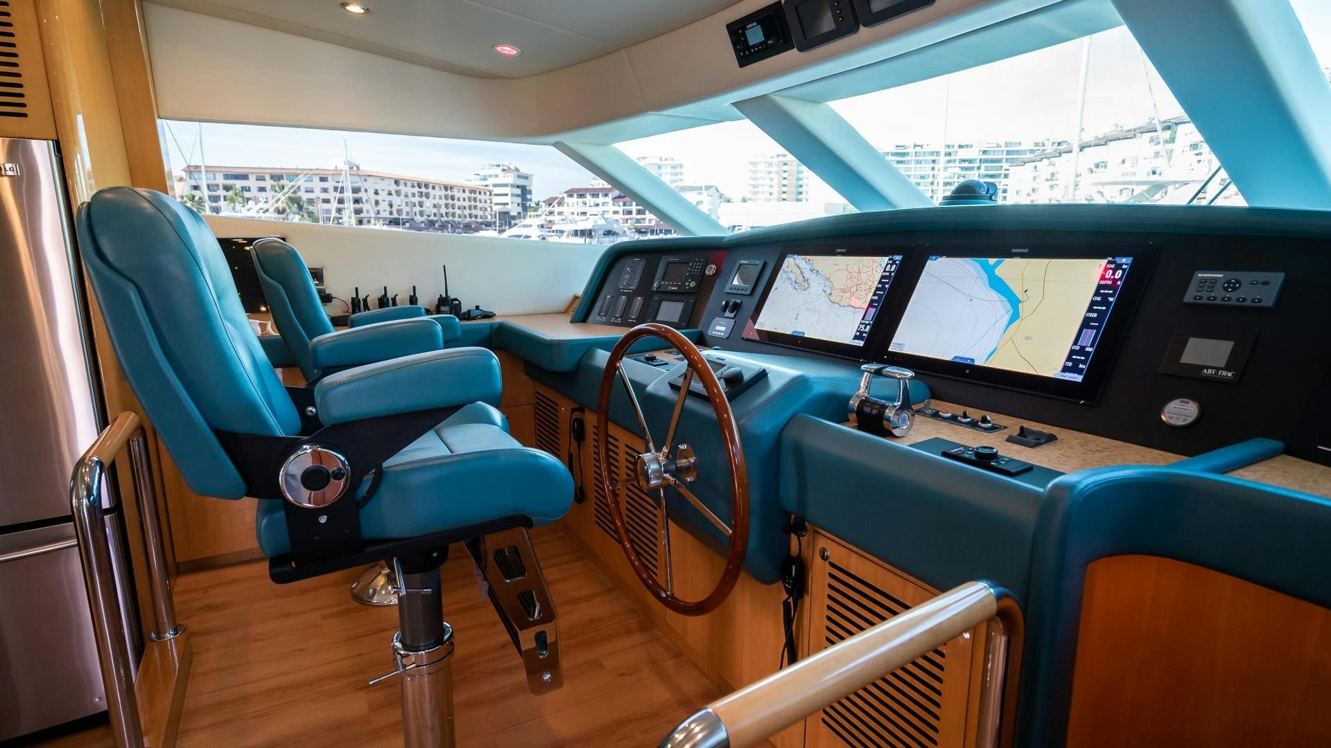 a room with a table and chairs aboard FULL HOUSE Yacht for Sale