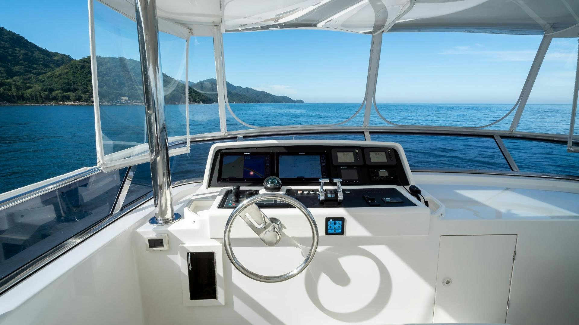 a boat on the water aboard FULL HOUSE Yacht for Sale