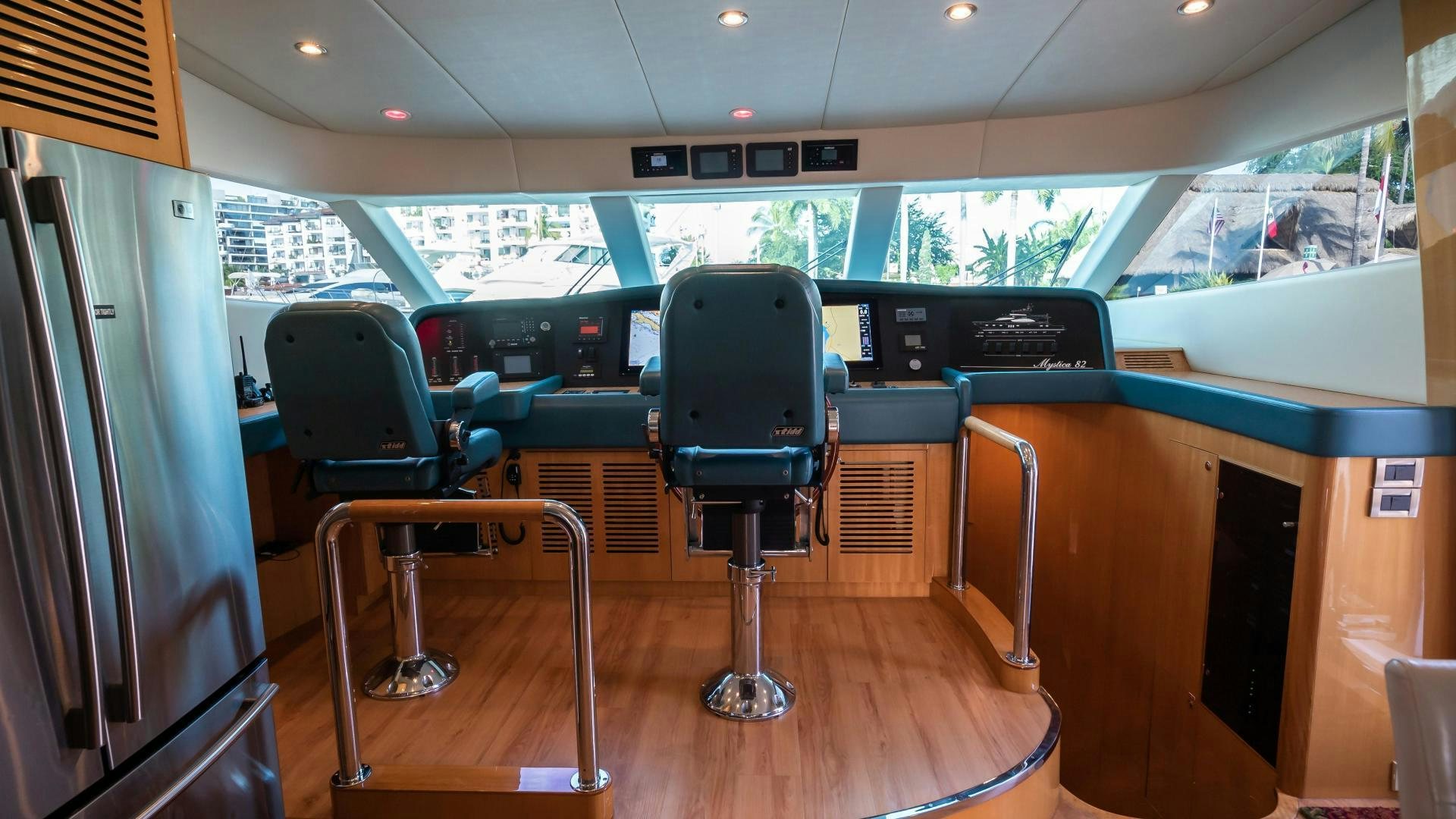 chairs in a room aboard FULL HOUSE Yacht for Sale