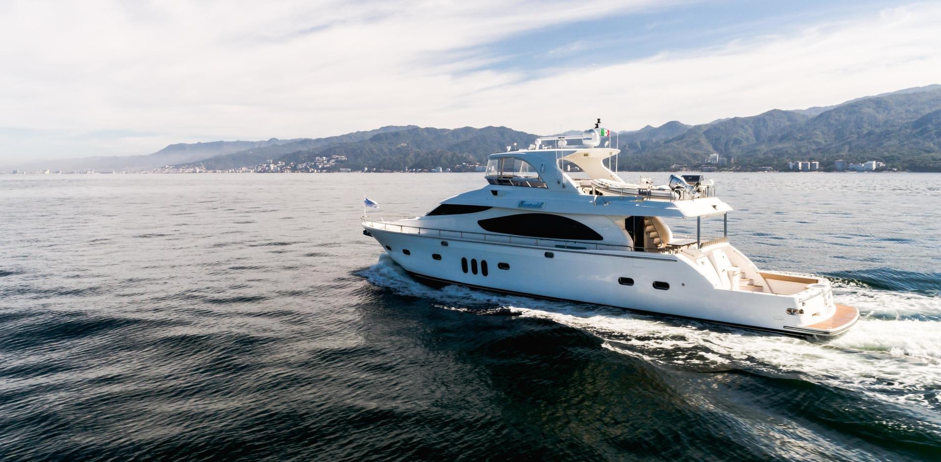 a boat on the water aboard FULL HOUSE Yacht for Sale