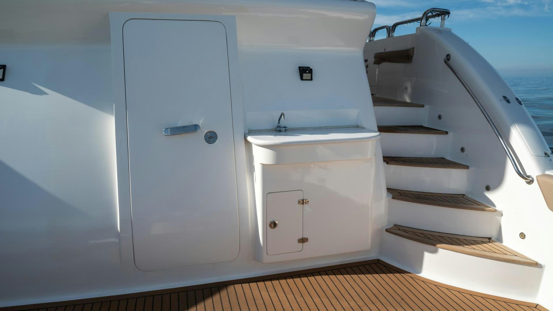 a white cabinet with drawers aboard FULL HOUSE Yacht for Sale