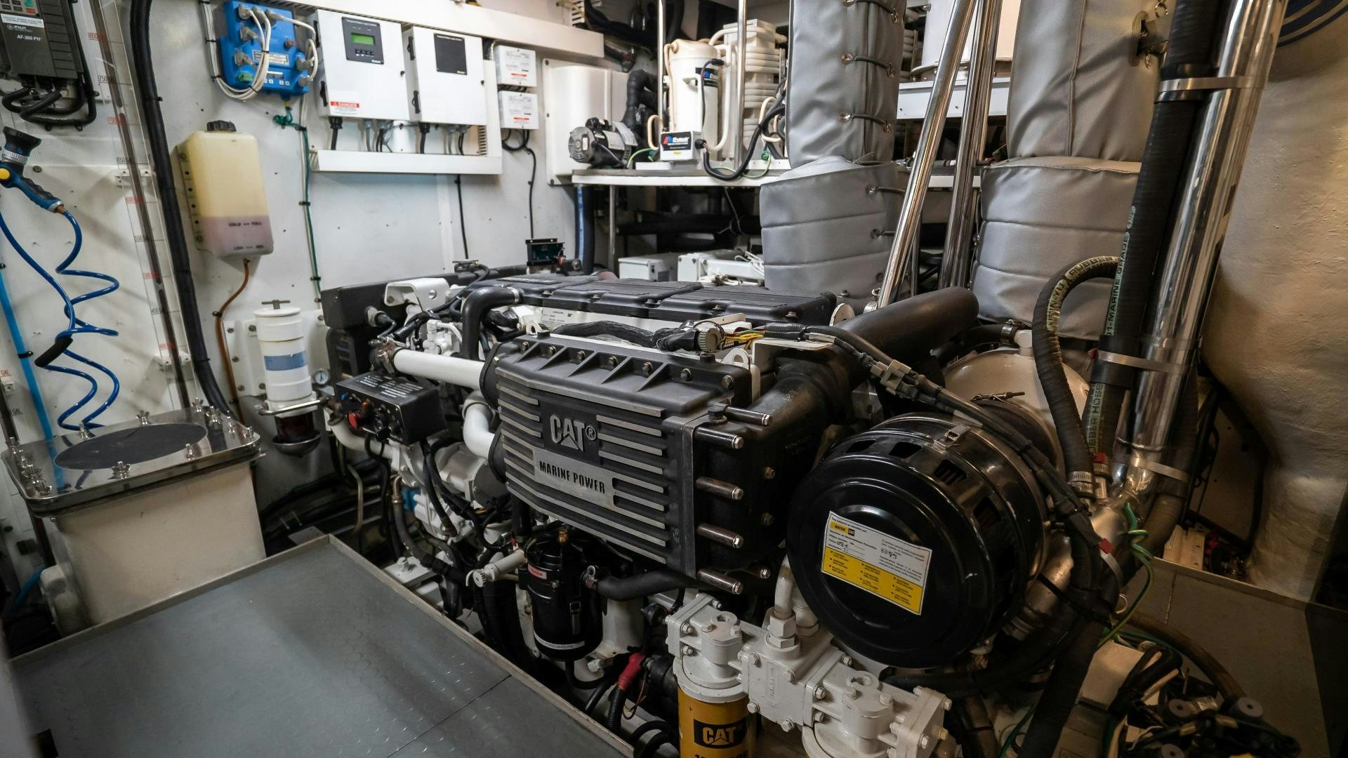 a machine with a large metal cylinder aboard FULL HOUSE Yacht for Sale