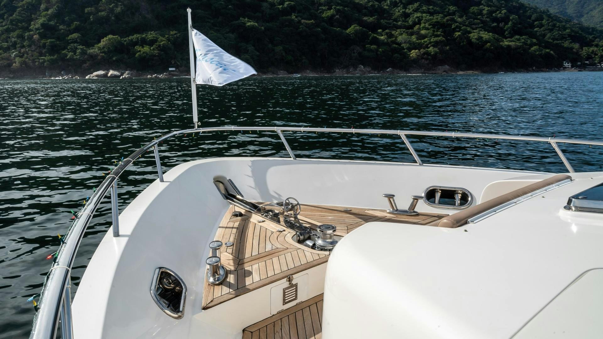 a boat on the water aboard FULL HOUSE Yacht for Sale