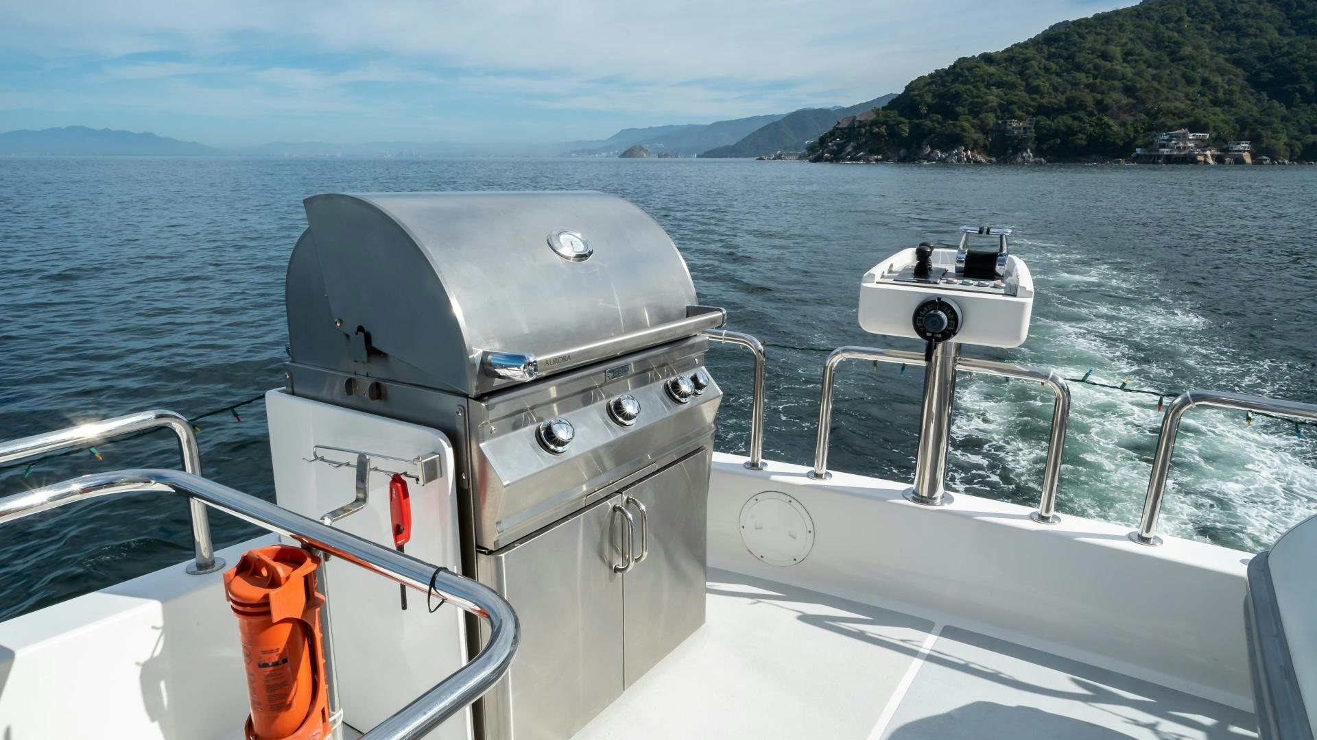 a boat on the water aboard FULL HOUSE Yacht for Sale