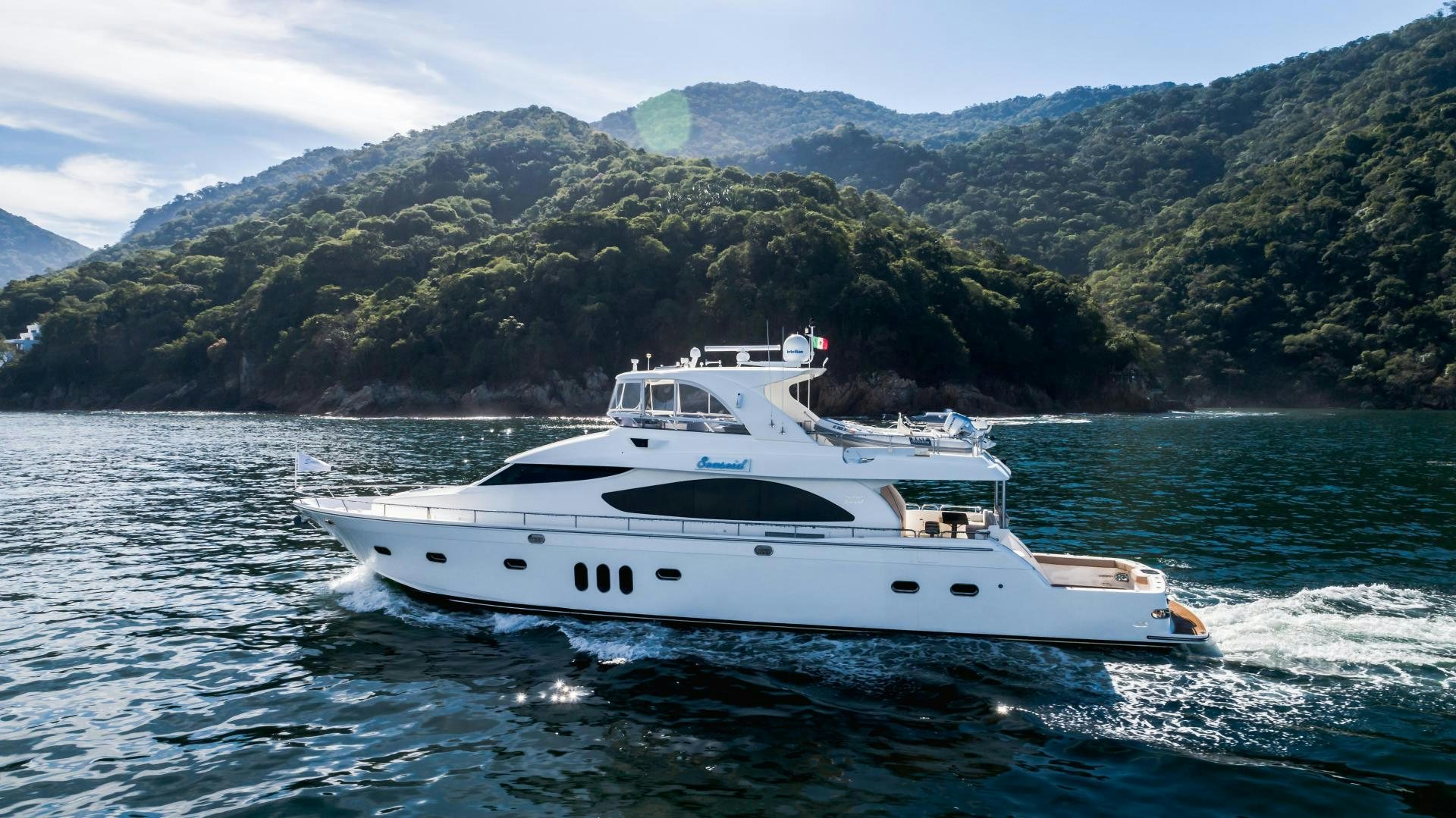 a boat on the water aboard FULL HOUSE Yacht for Sale