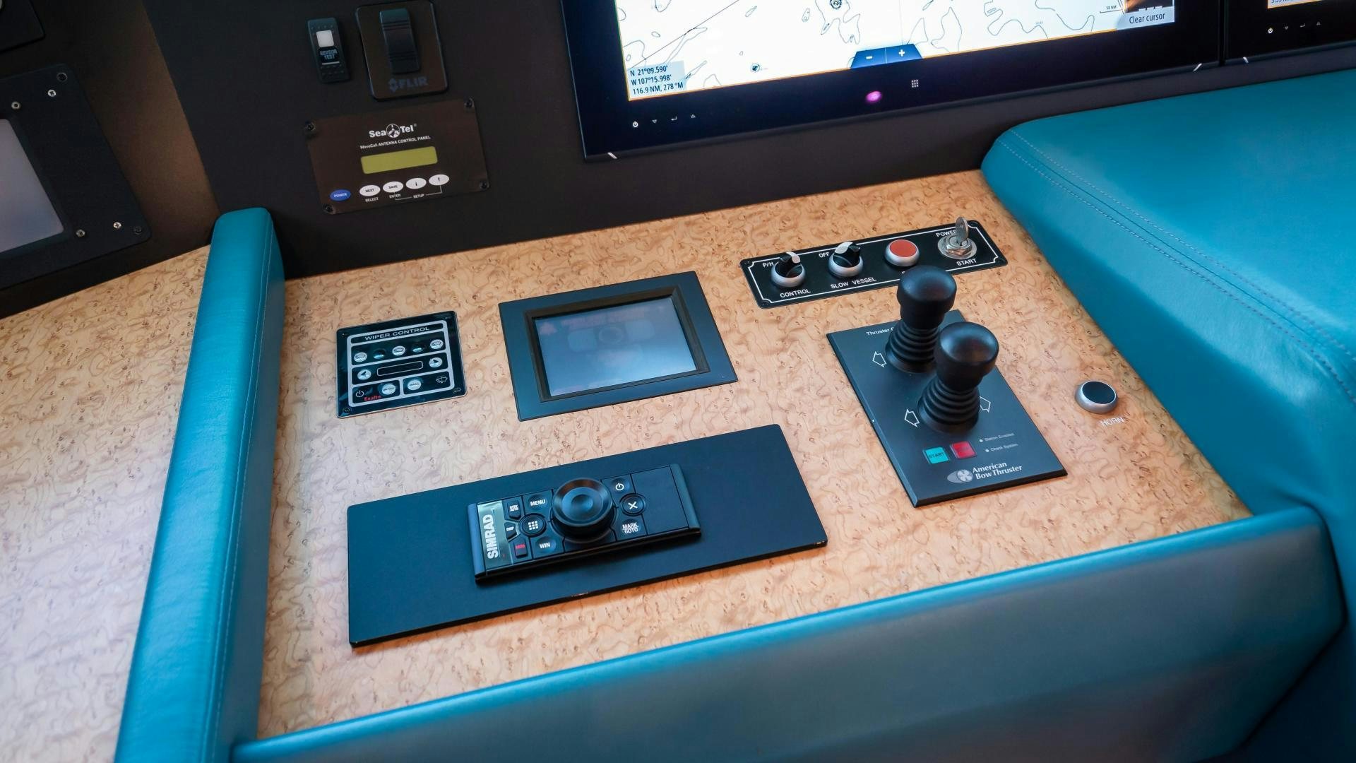 a black video game console aboard FULL HOUSE Yacht for Sale