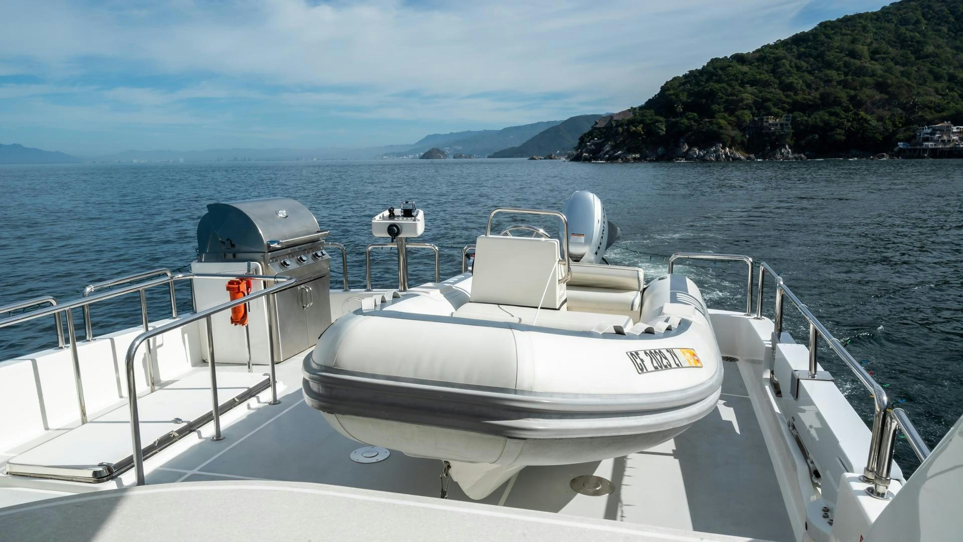 a boat on the water aboard FULL HOUSE Yacht for Sale
