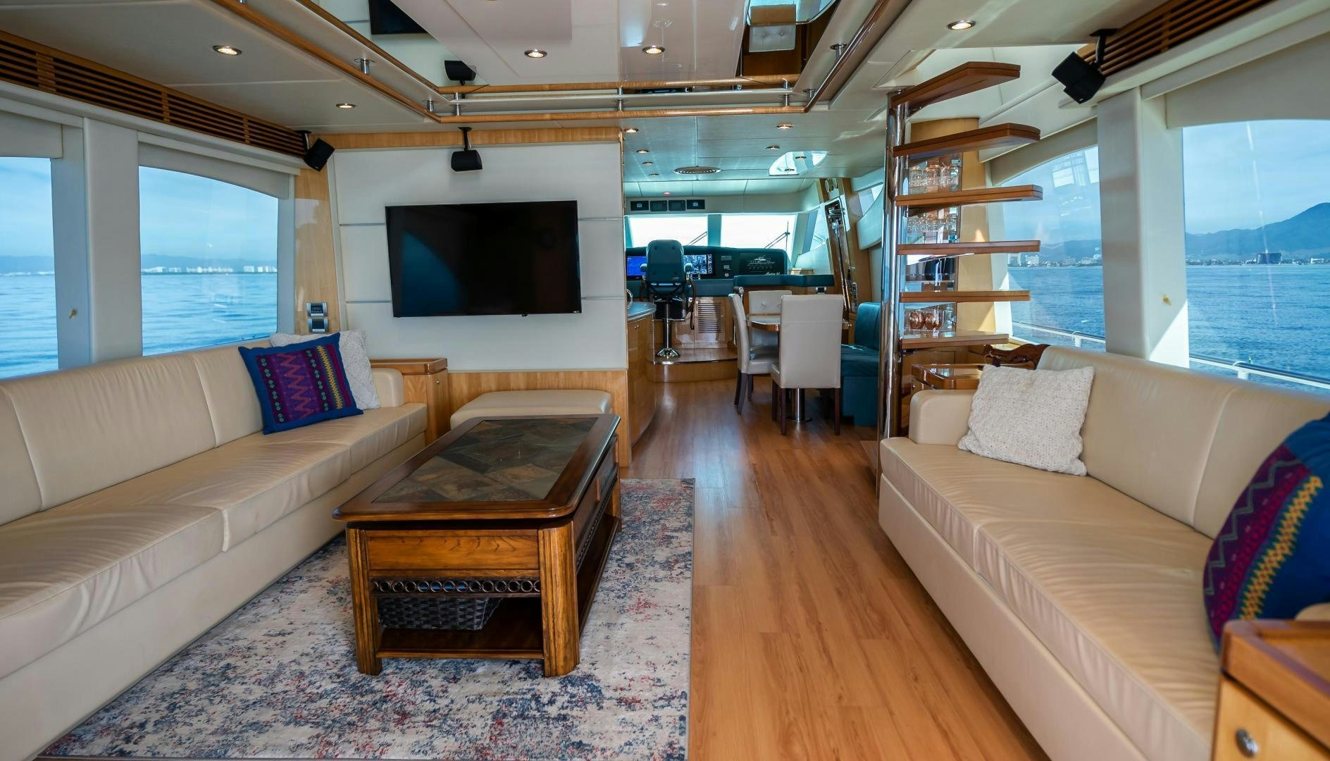 a living room with a couch and a tv aboard FULL HOUSE Yacht for Sale