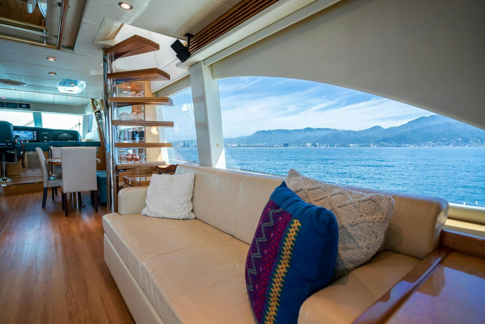 a living room with a large window aboard FULL HOUSE Yacht for Sale