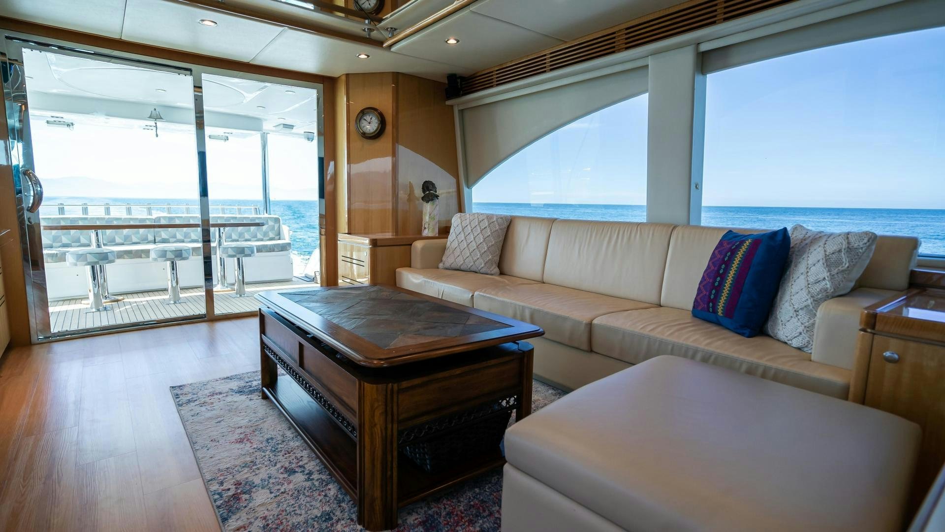 a living room with a large window aboard FULL HOUSE Yacht for Sale