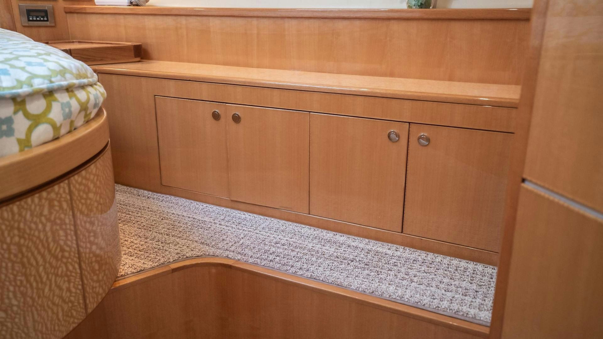 a wooden cabinet with drawers aboard FULL HOUSE Yacht for Sale