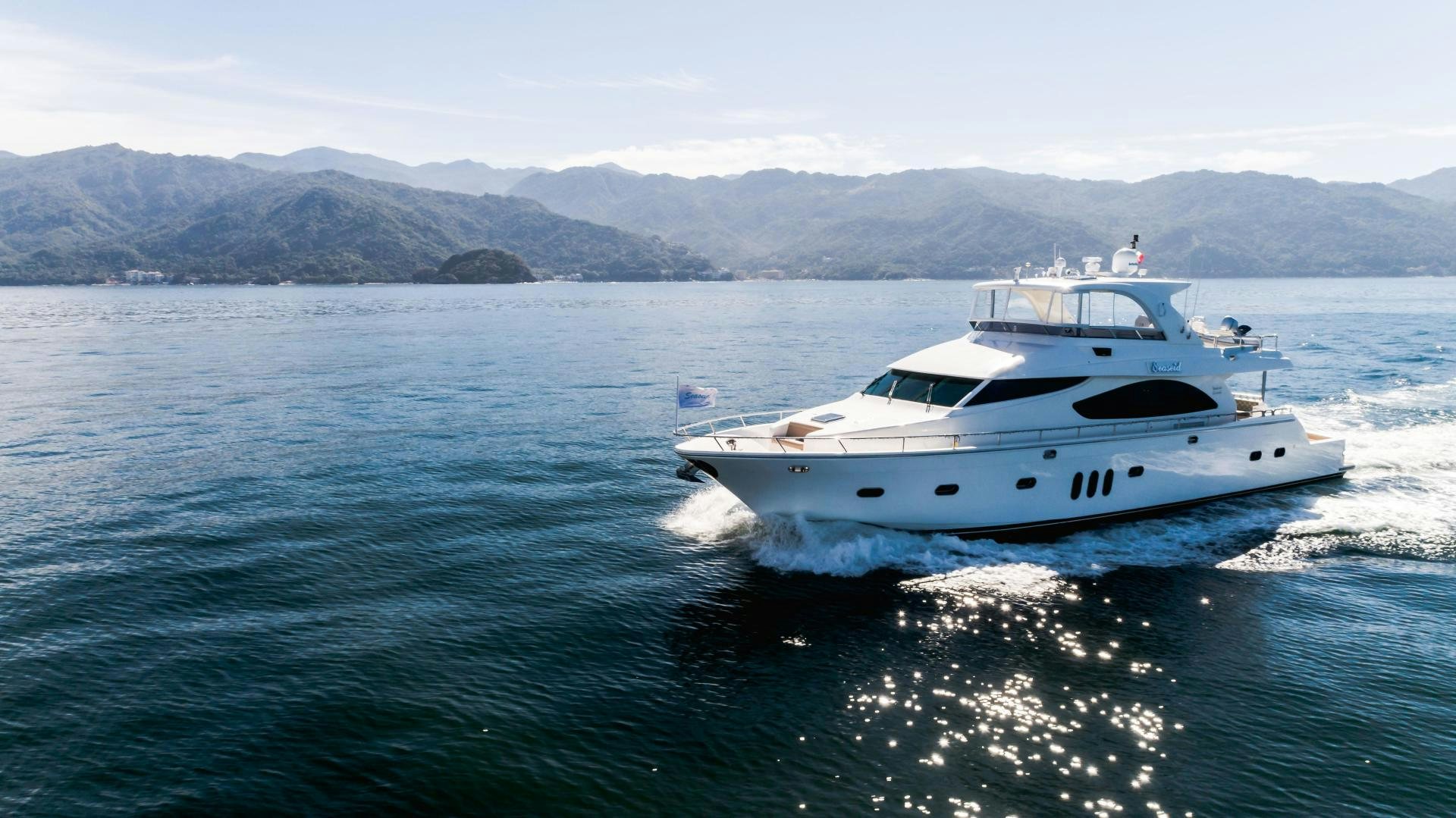 a boat on the water aboard FULL HOUSE Yacht for Sale
