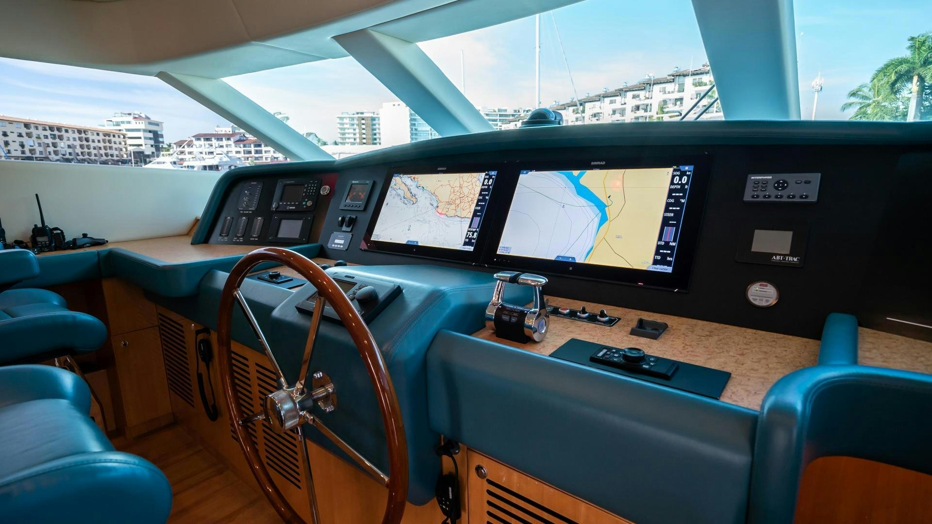 inside of a vehicle with a large screen and a large window aboard FULL HOUSE Yacht for Sale