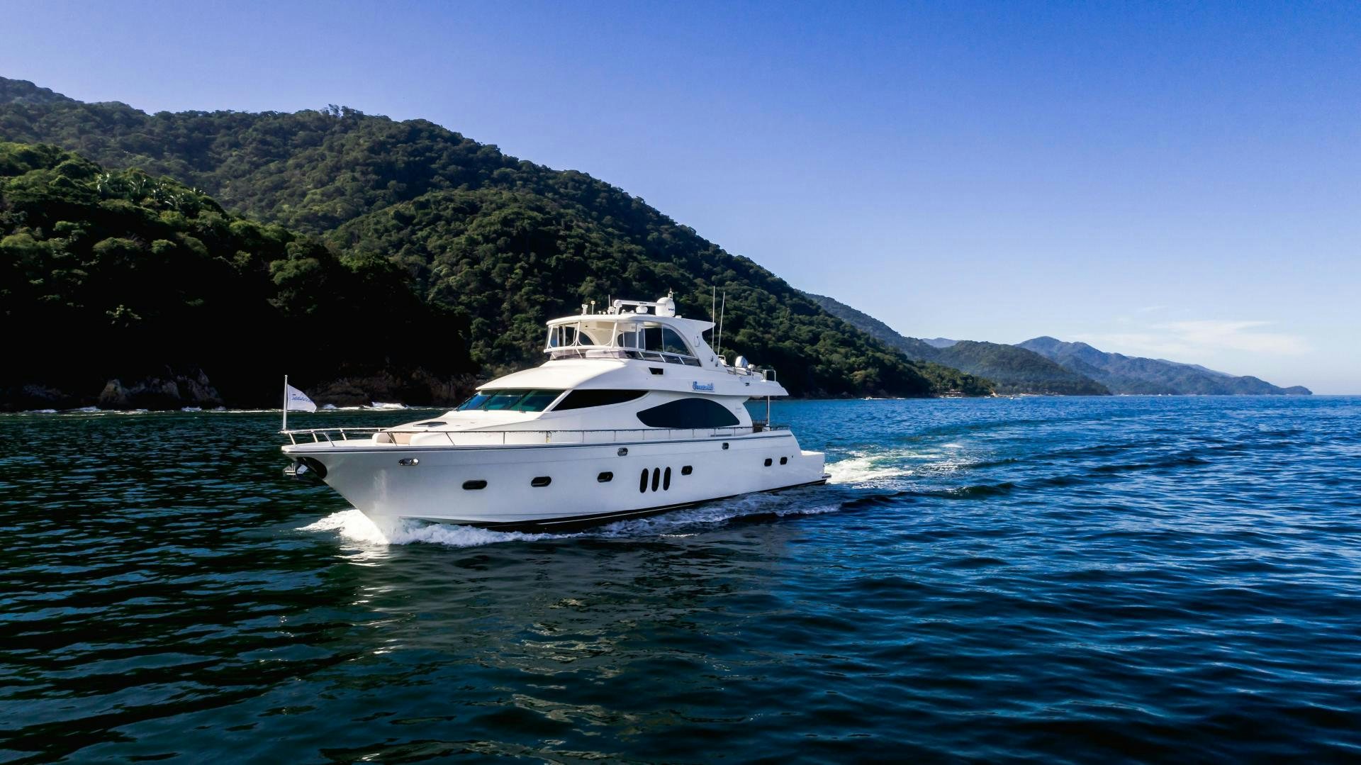 a boat on the water aboard FULL HOUSE Yacht for Sale