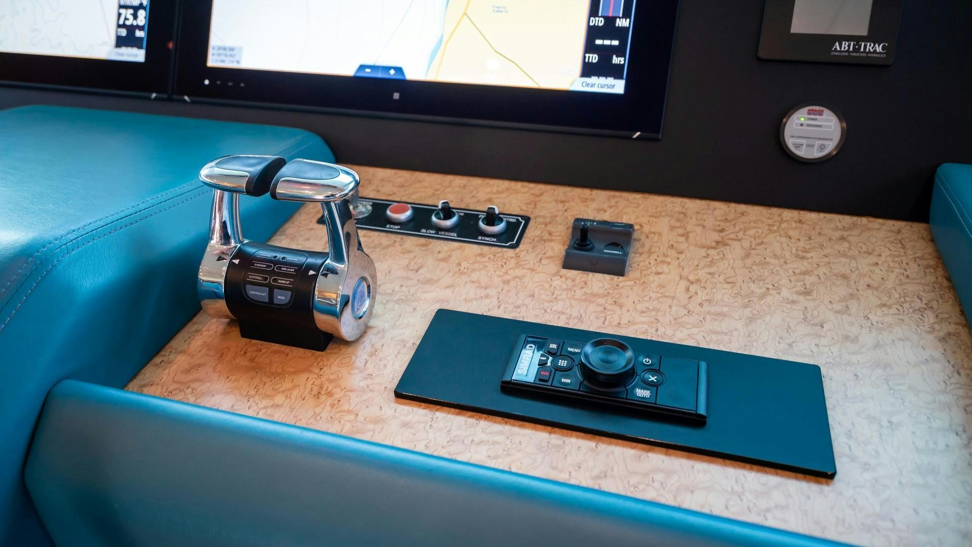 a video game console and controller aboard FULL HOUSE Yacht for Sale