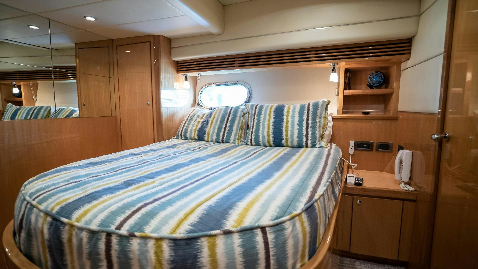 a bed in a room aboard FULL HOUSE Yacht for Sale