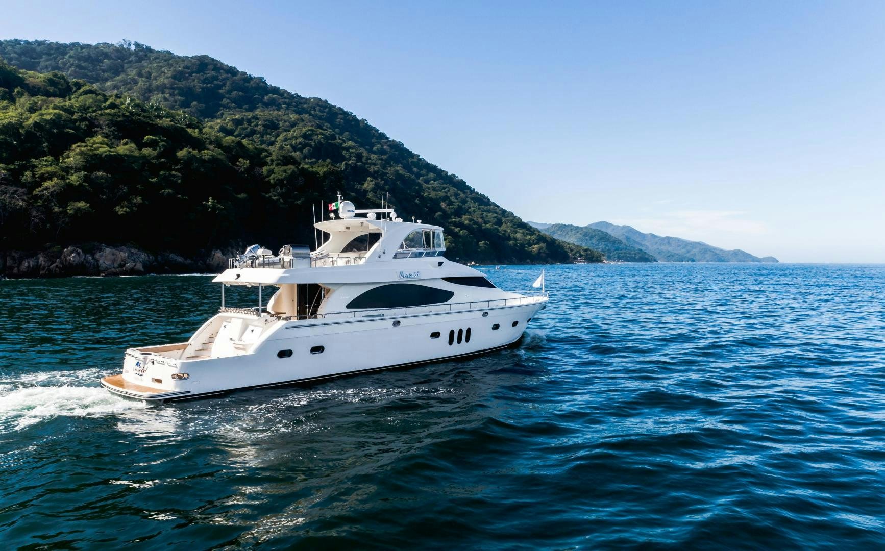 a boat on the water aboard FULL HOUSE Yacht for Sale