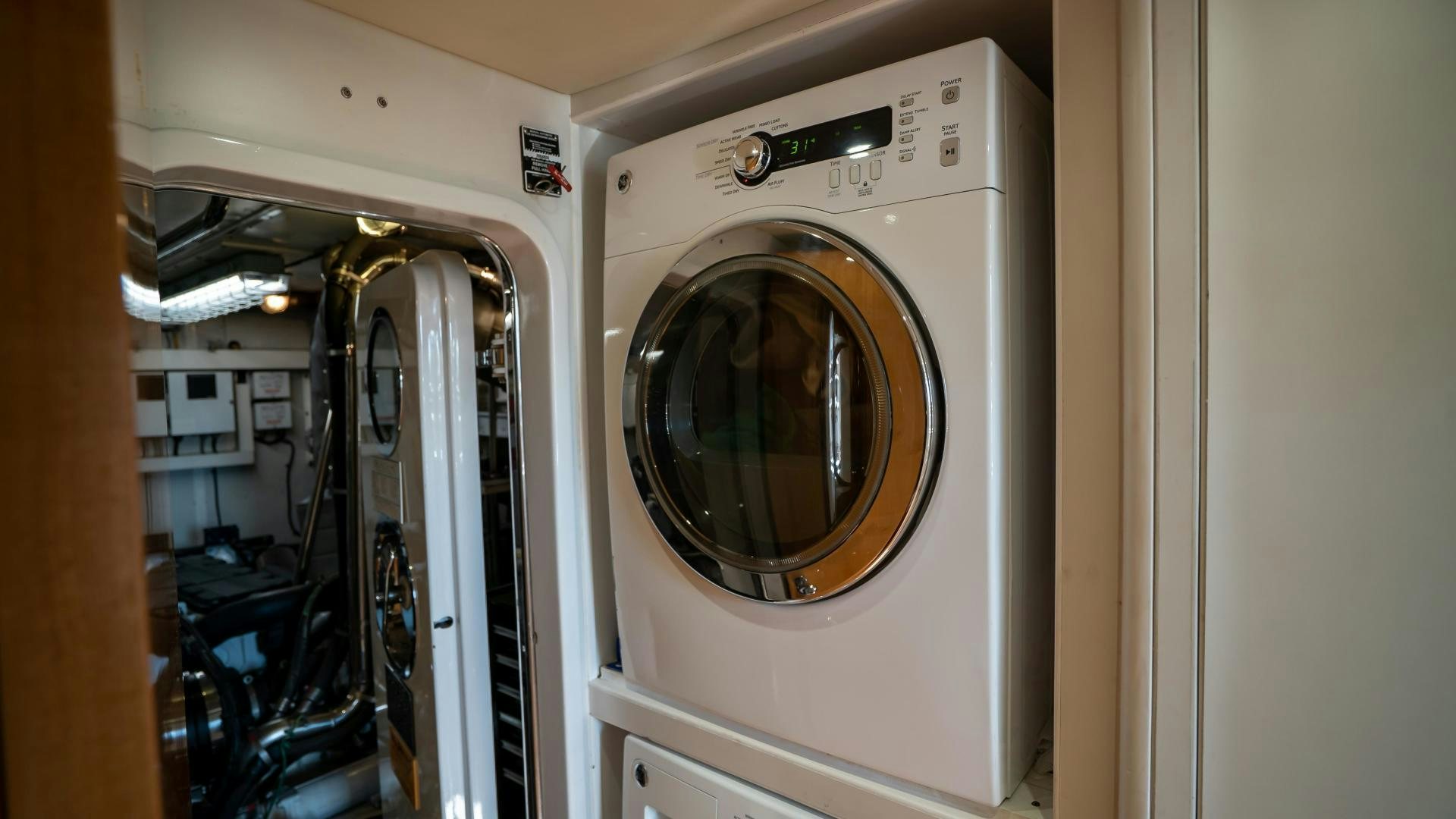 a white washing machine aboard FULL HOUSE Yacht for Sale