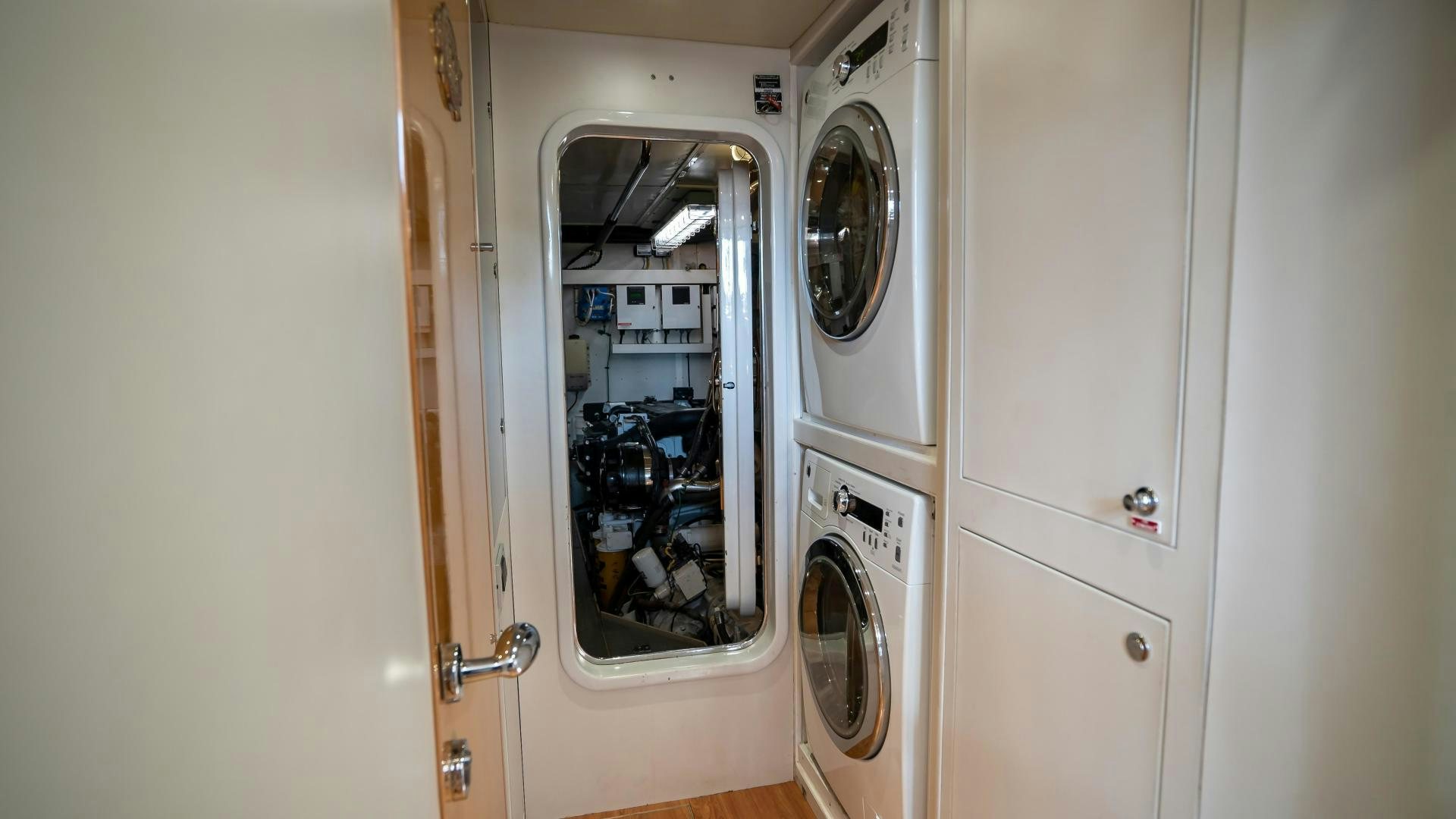 a closet with white drawers aboard FULL HOUSE Yacht for Sale