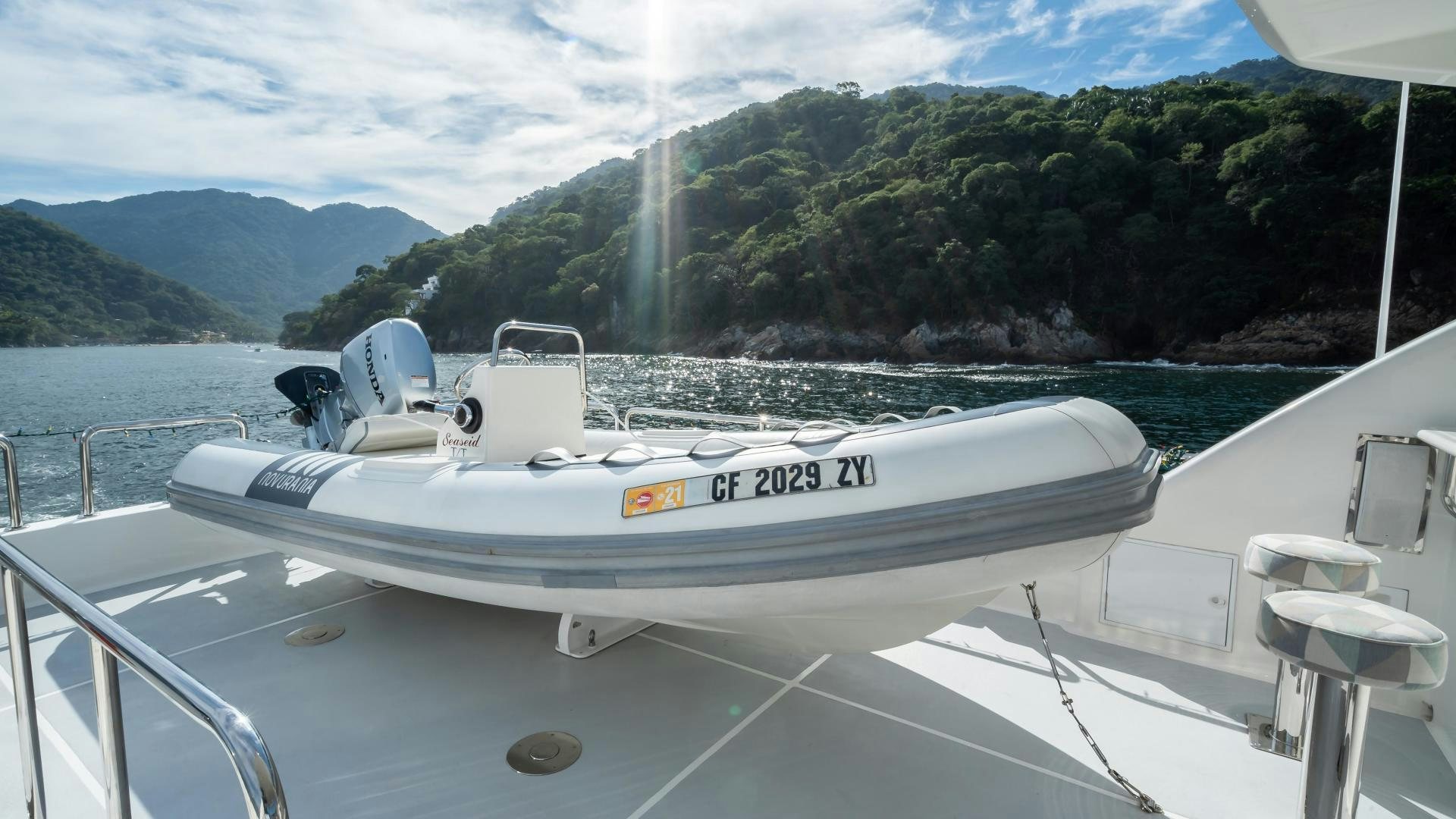 a boat on a deck aboard FULL HOUSE Yacht for Sale