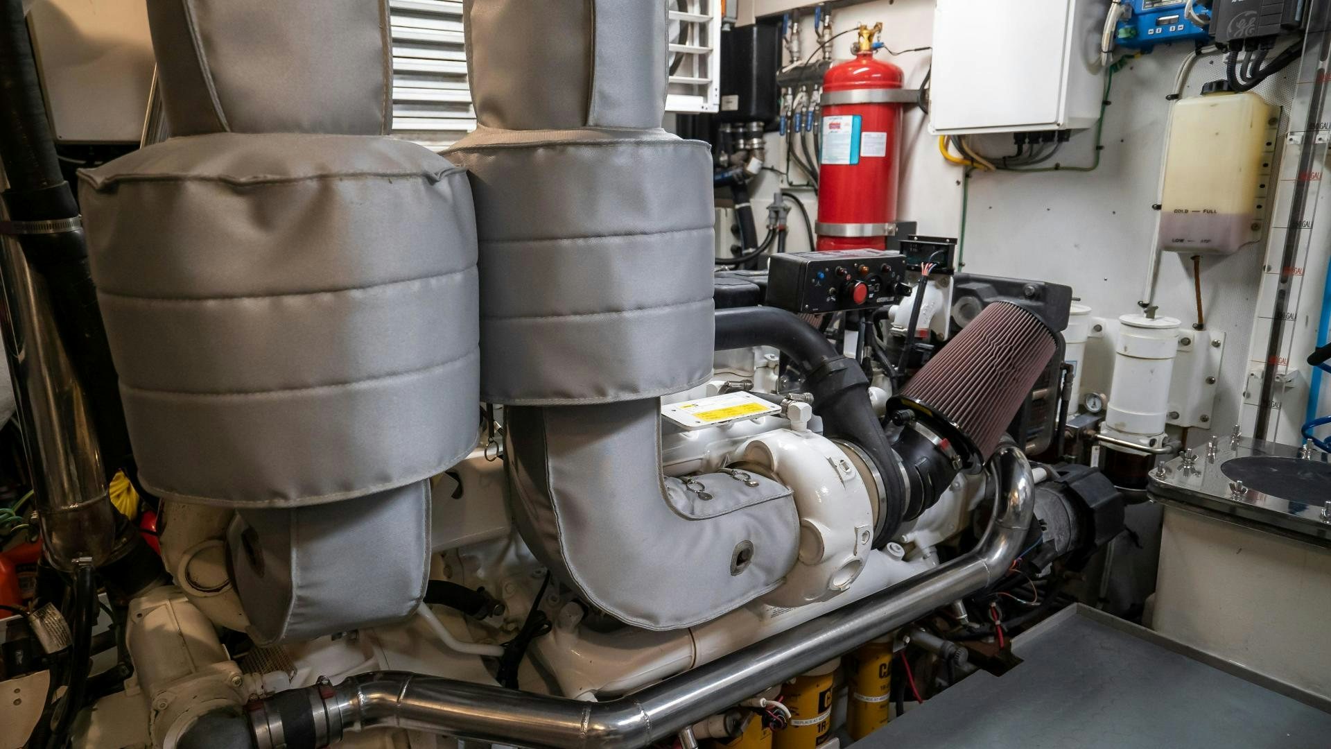 a machine with a large metal cylinder aboard FULL HOUSE Yacht for Sale