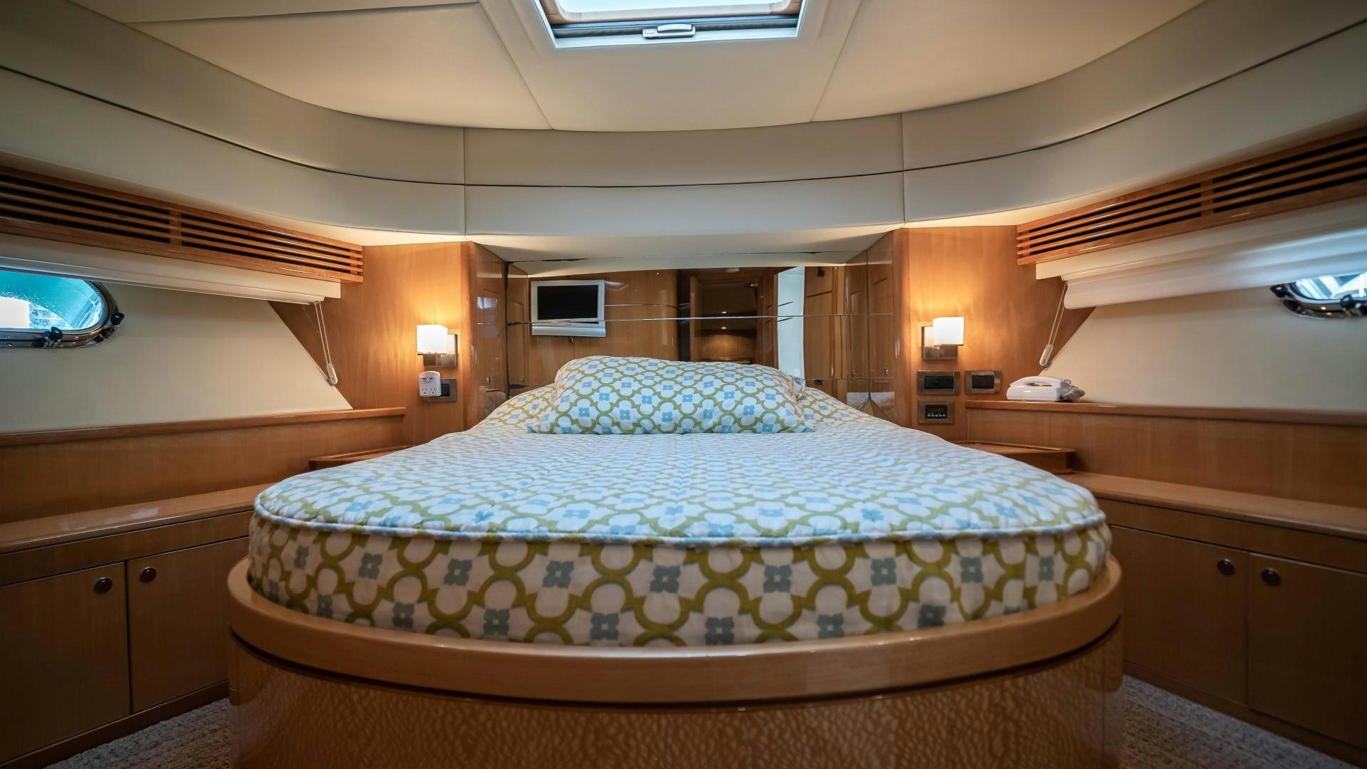 a bed in a room aboard FULL HOUSE Yacht for Sale