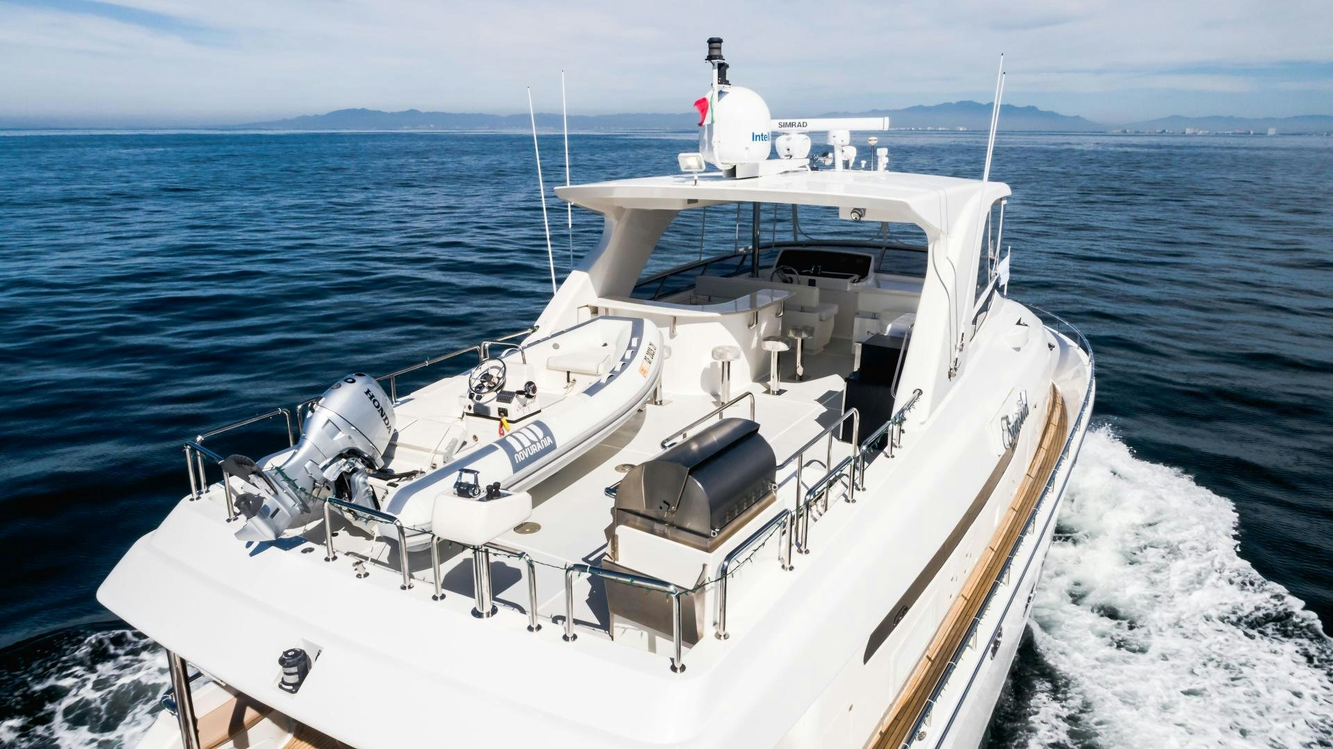 a boat on the water aboard FULL HOUSE Yacht for Sale
