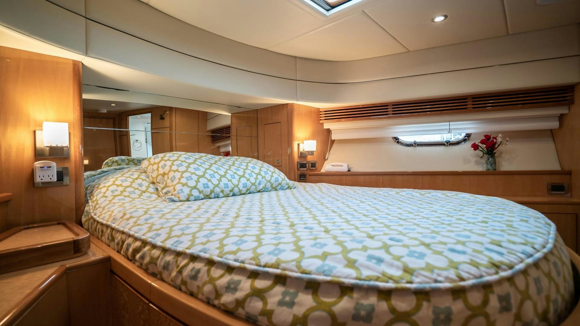 a bed in a room aboard FULL HOUSE Yacht for Sale