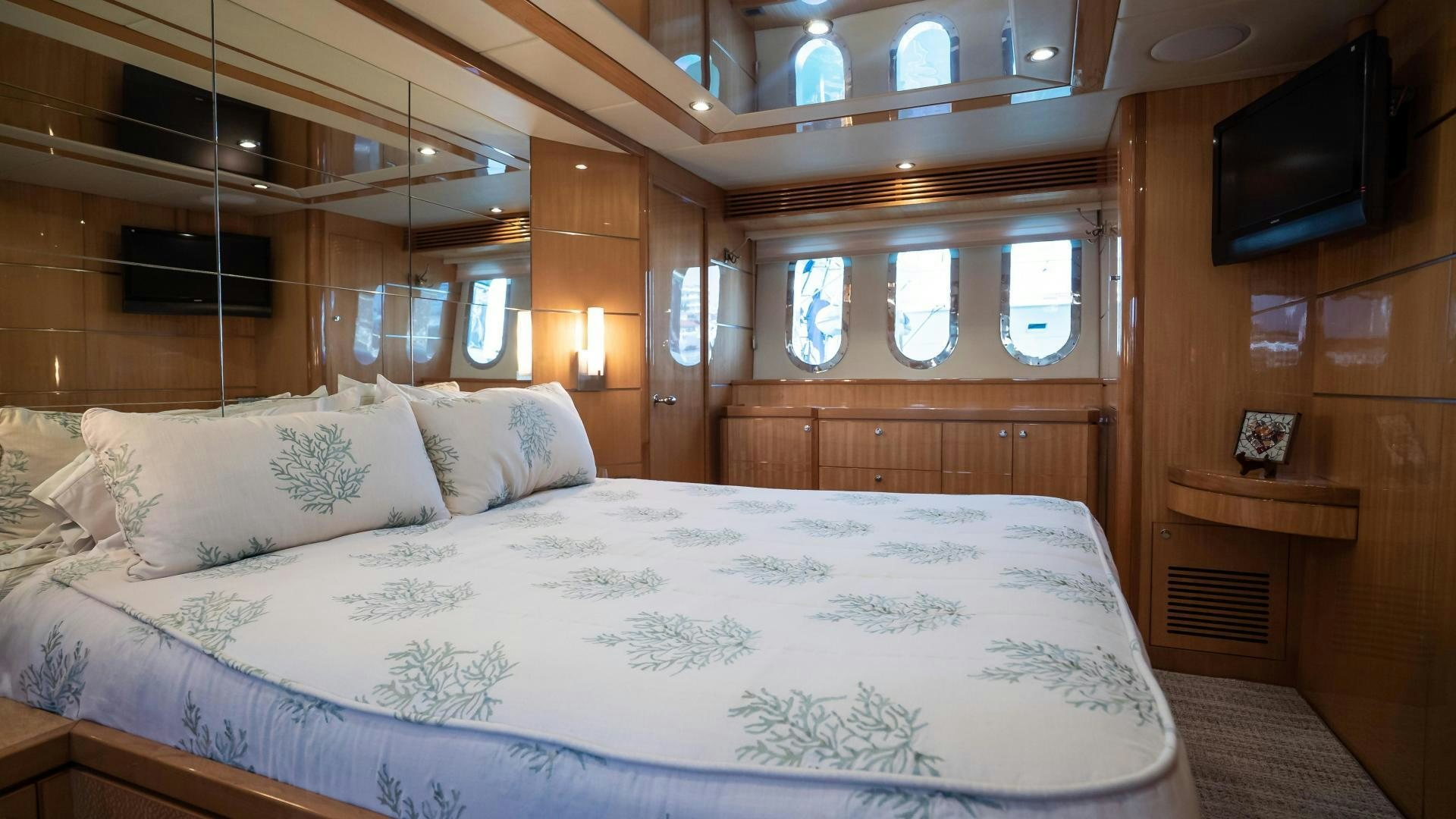 a bed with white sheets aboard FULL HOUSE Yacht for Sale