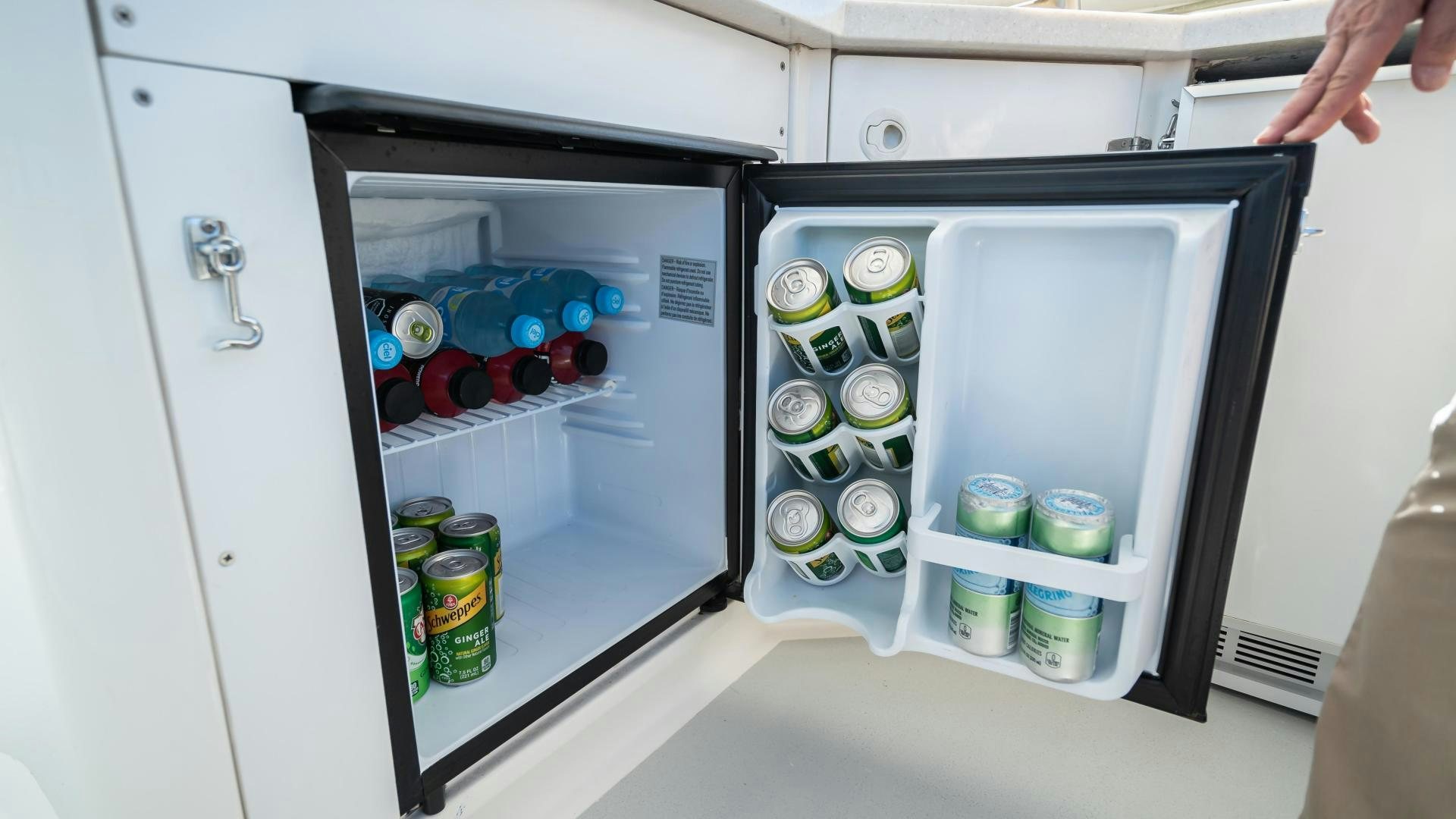 a mini fridge with drinks aboard FULL HOUSE Yacht for Sale