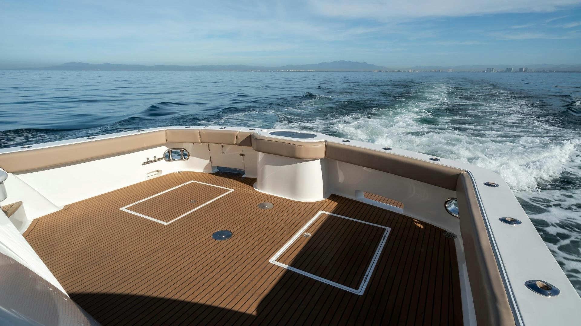 a boat on the water aboard FULL HOUSE Yacht for Sale
