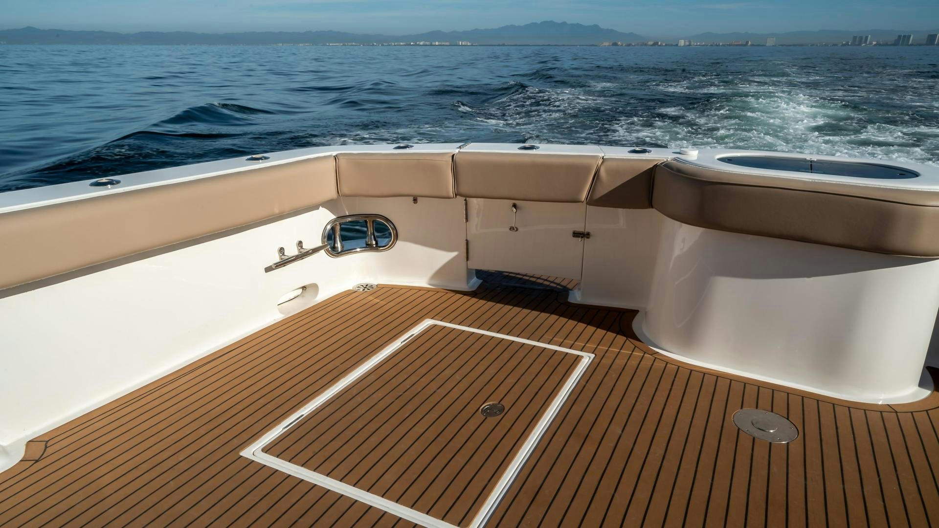 a boat on the water aboard FULL HOUSE Yacht for Sale