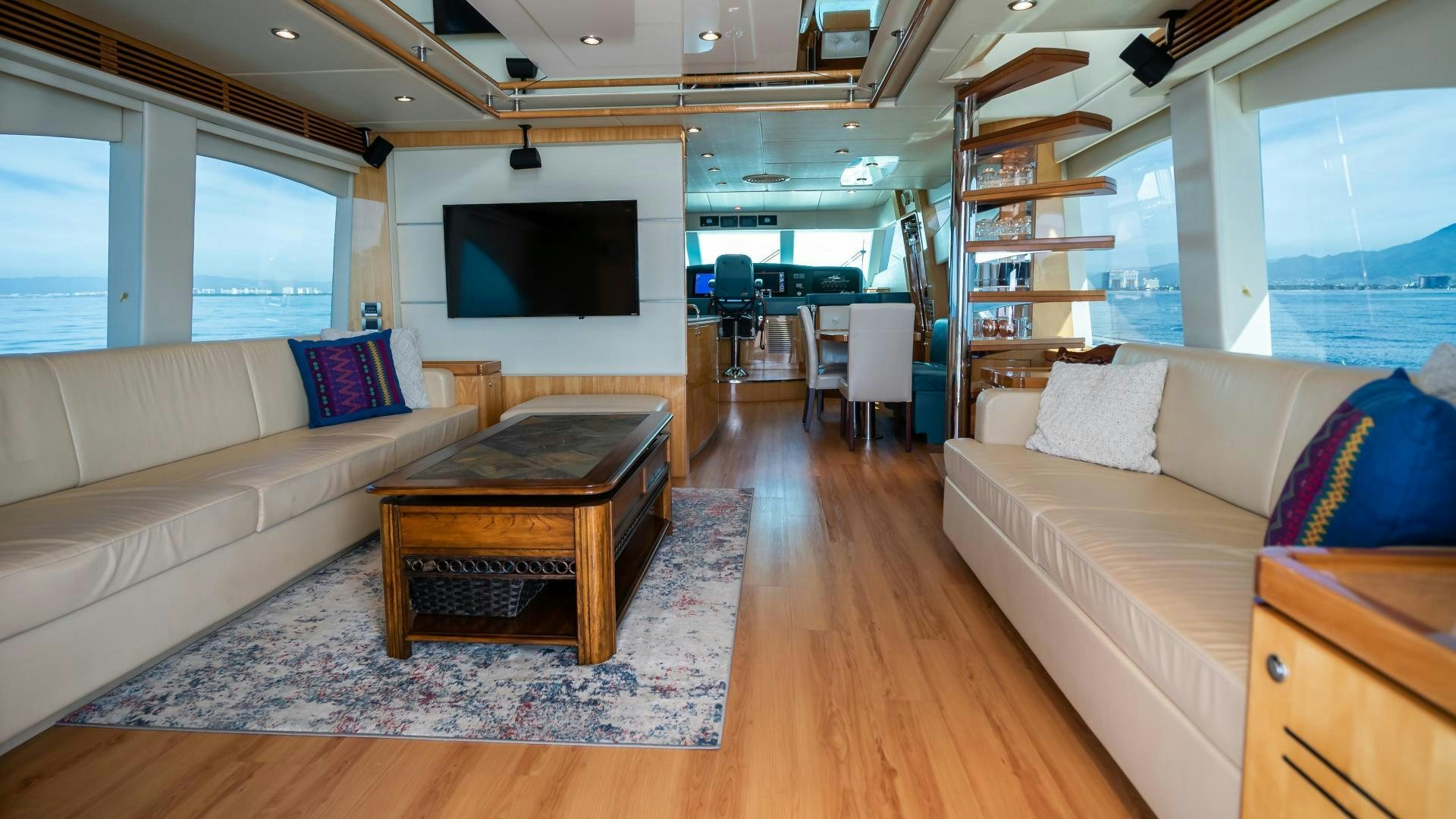 a living room with a couch and a tv aboard FULL HOUSE Yacht for Sale