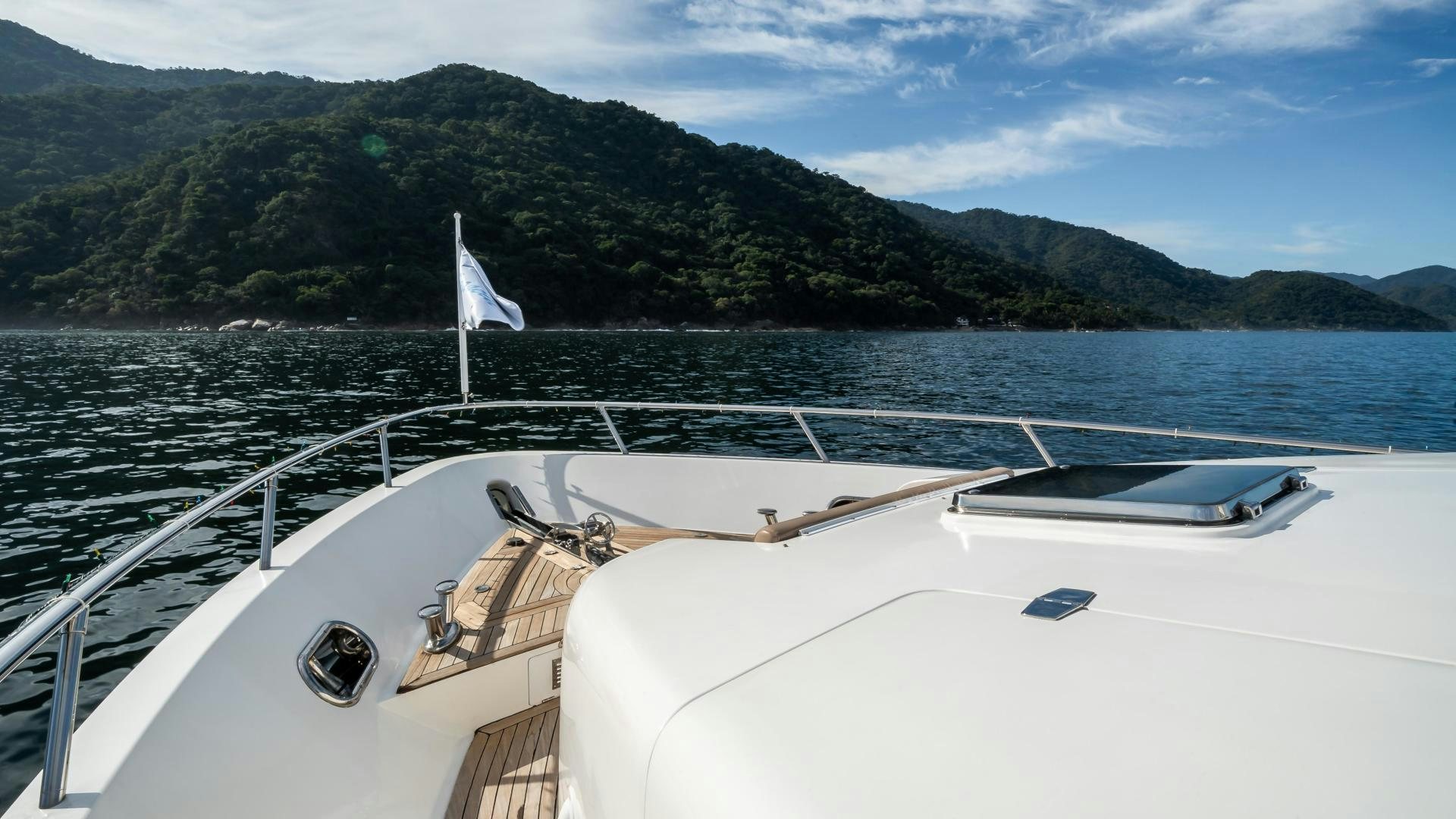 a boat on the water aboard FULL HOUSE Yacht for Sale