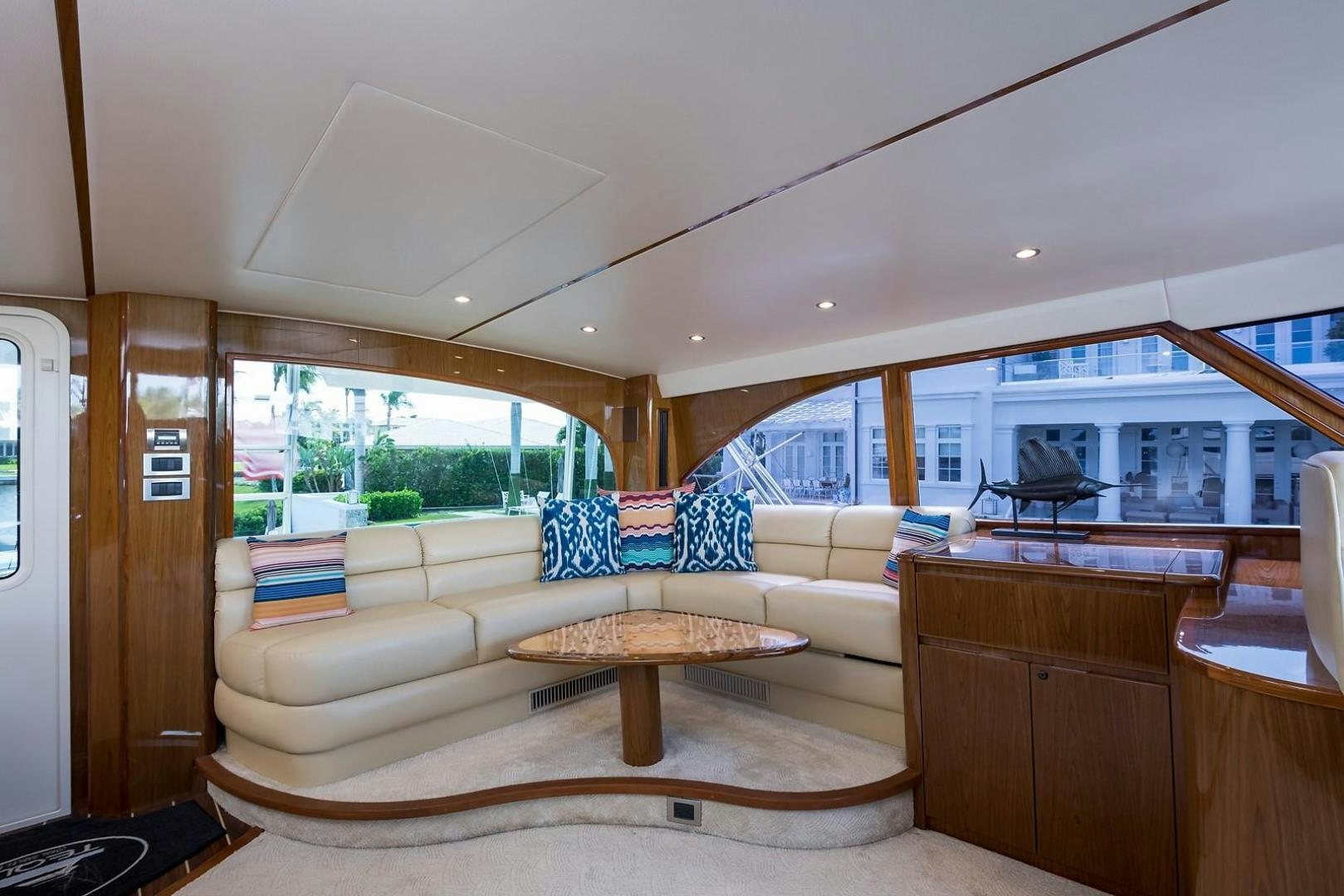 a living room with a couch and a table aboard NO NAME 82 Yacht for Sale
