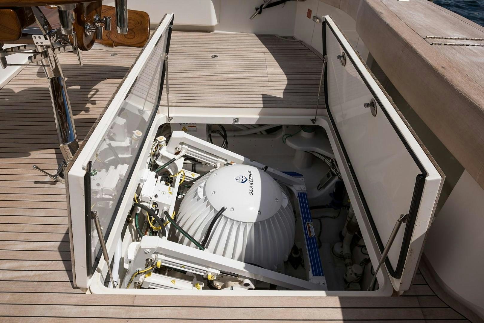 a machine with a large piece of equipment in it aboard NO NAME 82 Yacht for Sale