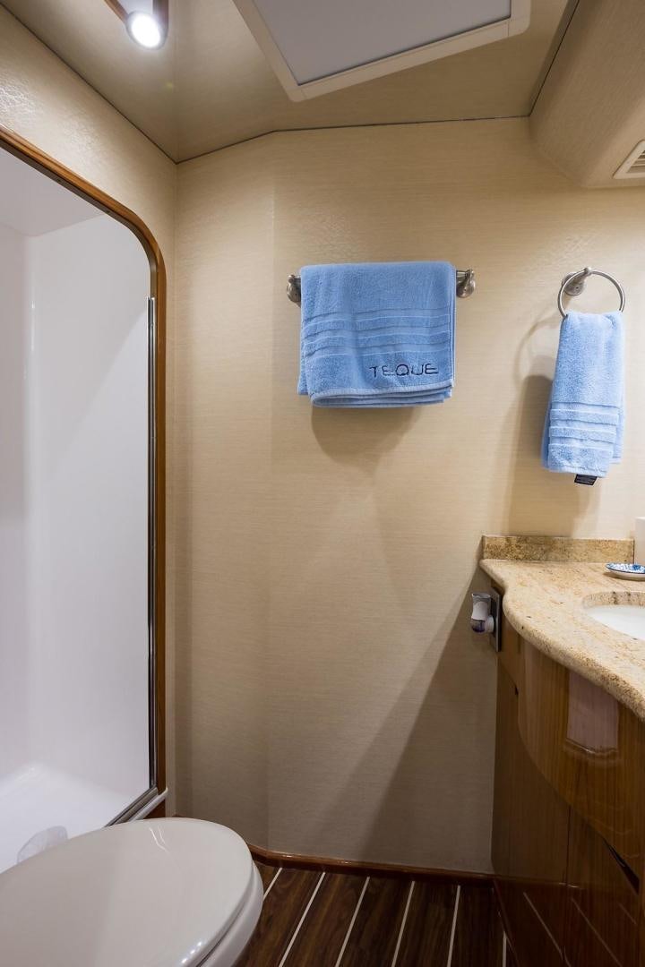 a bathroom with a towel on the wall aboard NO NAME 82 Yacht for Sale