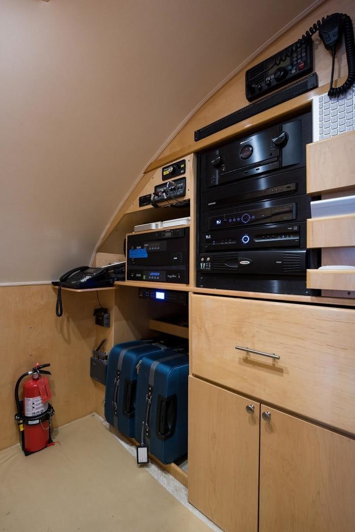 a shelf with electronic equipment aboard NO NAME 82 Yacht for Sale