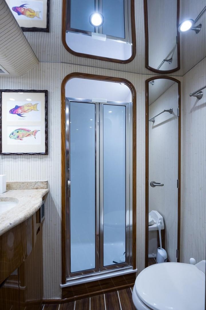 a bathroom with a shower unit and a sink aboard NO NAME 82 Yacht for Sale