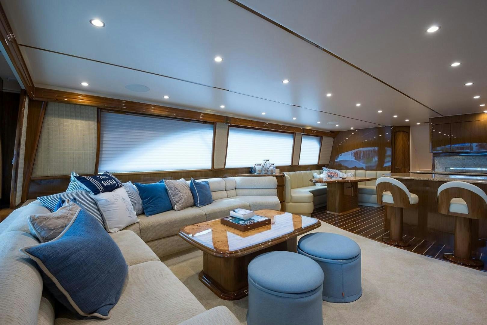 a living room with a couch and a table aboard NO NAME 82 Yacht for Sale