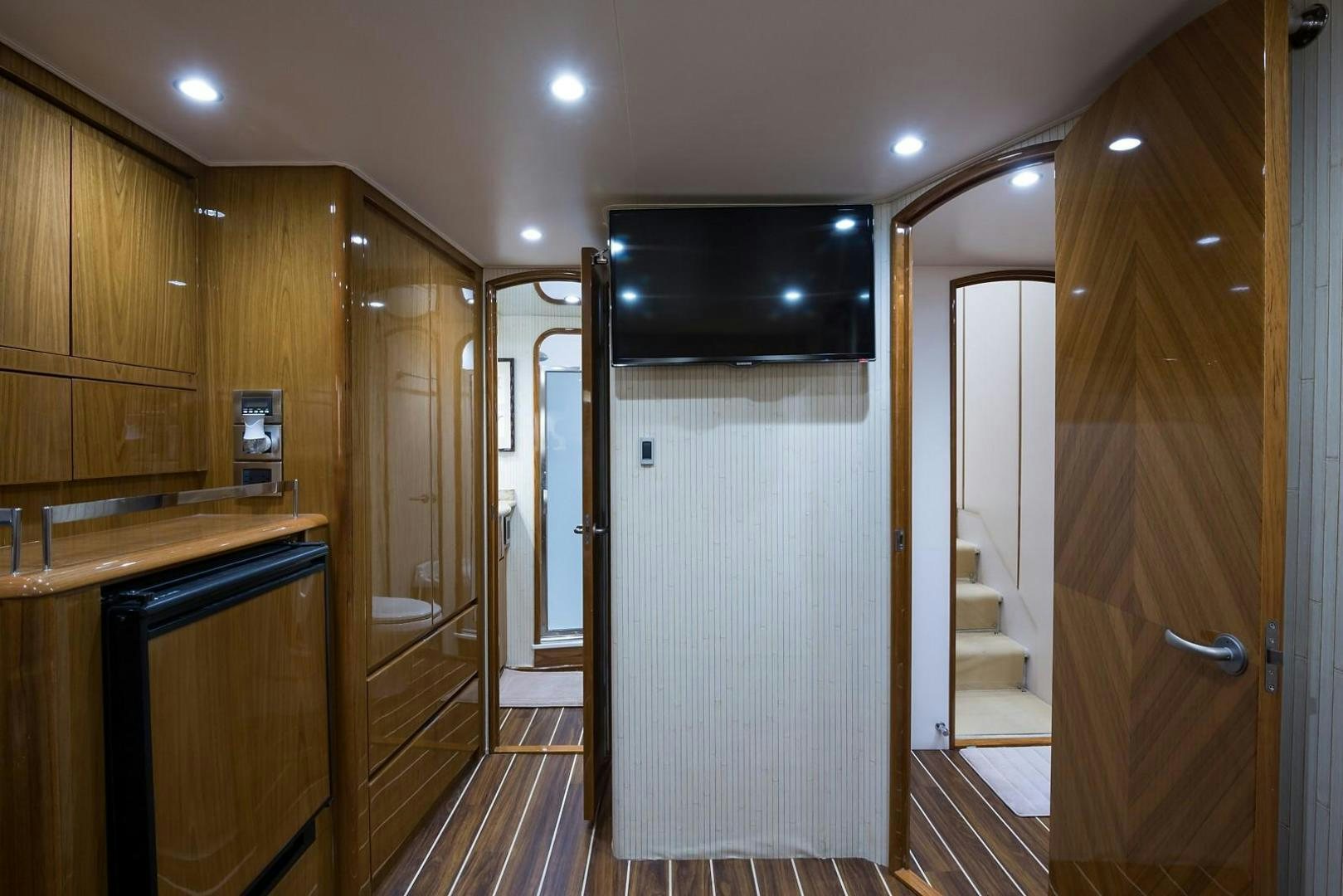 a bathroom with wooden cabinets aboard NO NAME 82 Yacht for Sale