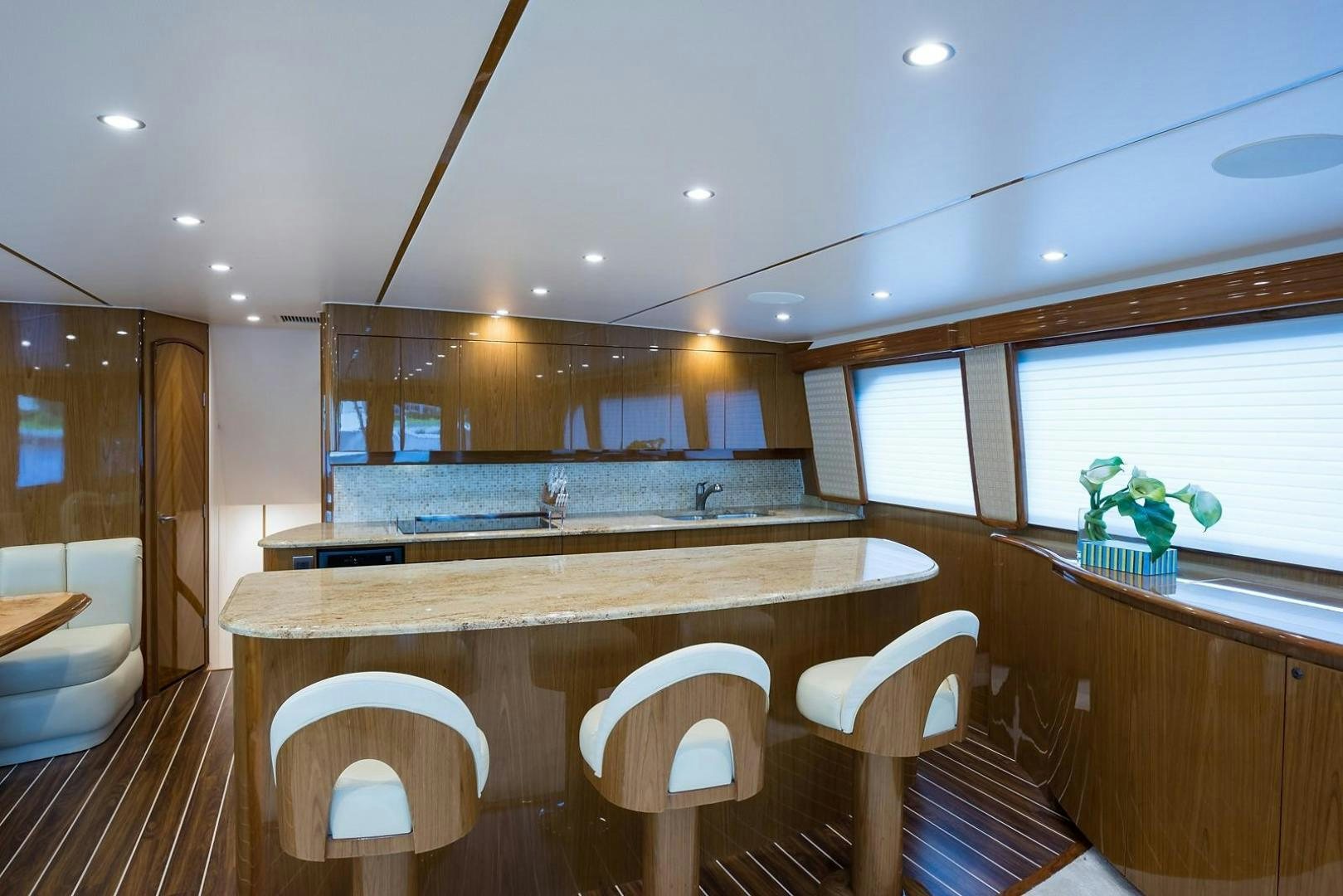 a kitchen with a large island aboard NO NAME 82 Yacht for Sale