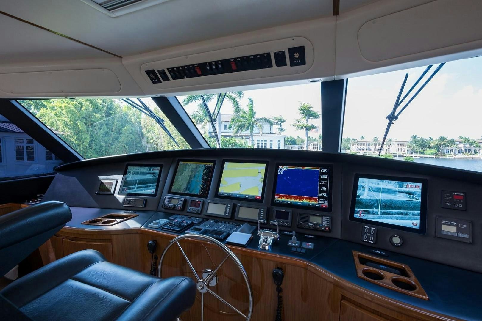 a group of monitors on a table aboard NO NAME 82 Yacht for Sale
