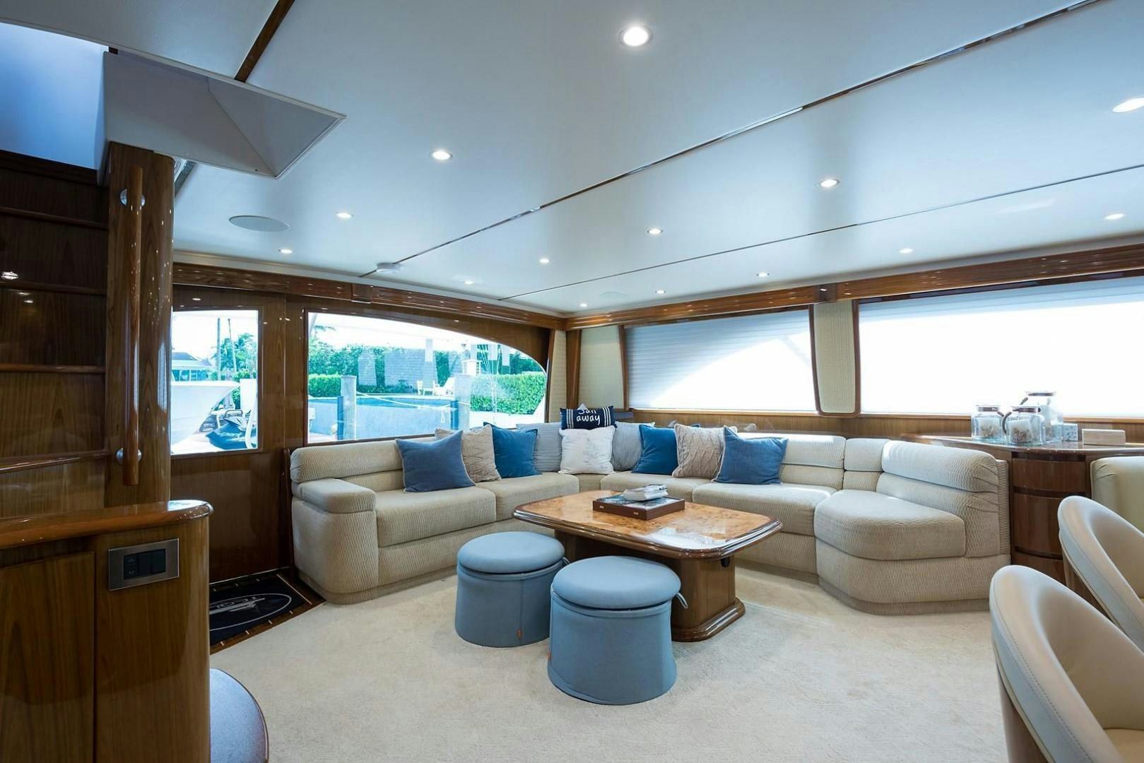 a living room with a couch and a coffee table aboard NO NAME 82 Yacht for Sale